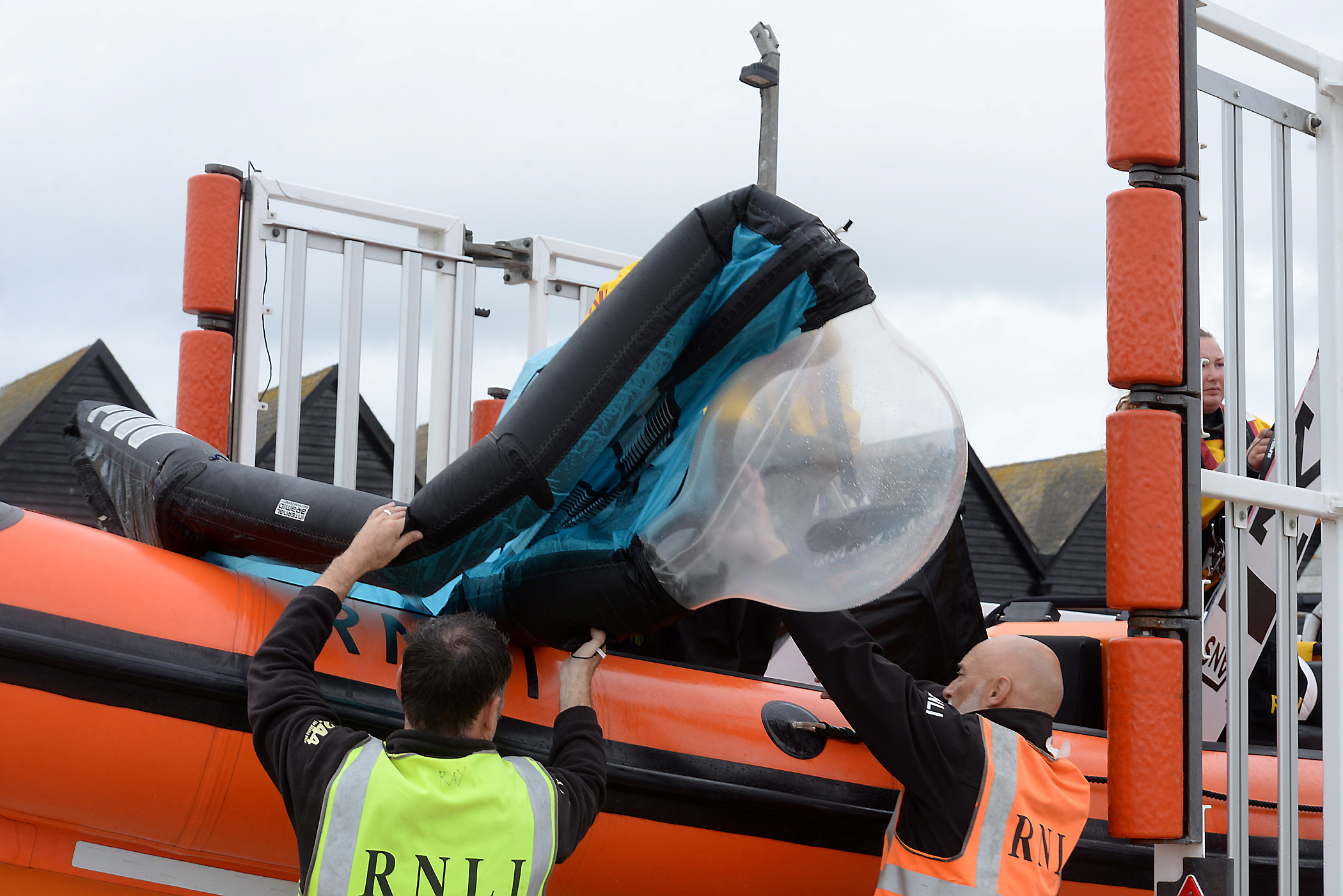 The damaged kite is unloaded from the lifeboat after it launched to assist a kitesurfer who got into difficulties following equipment failure just north west of the station on Wednesday afternoon. Picture: RNLI Whitstable.