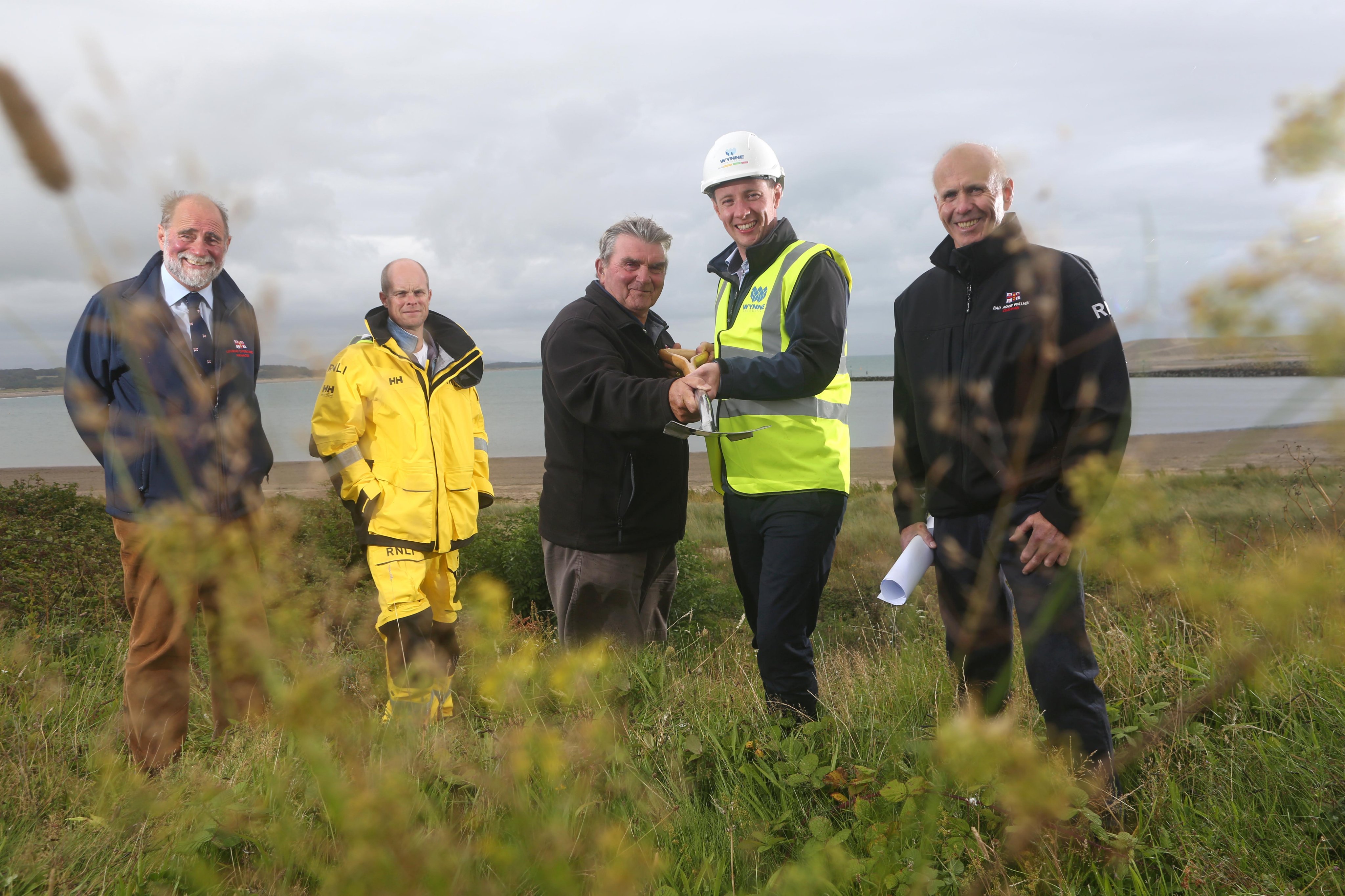 Members standing on new lifeboat site