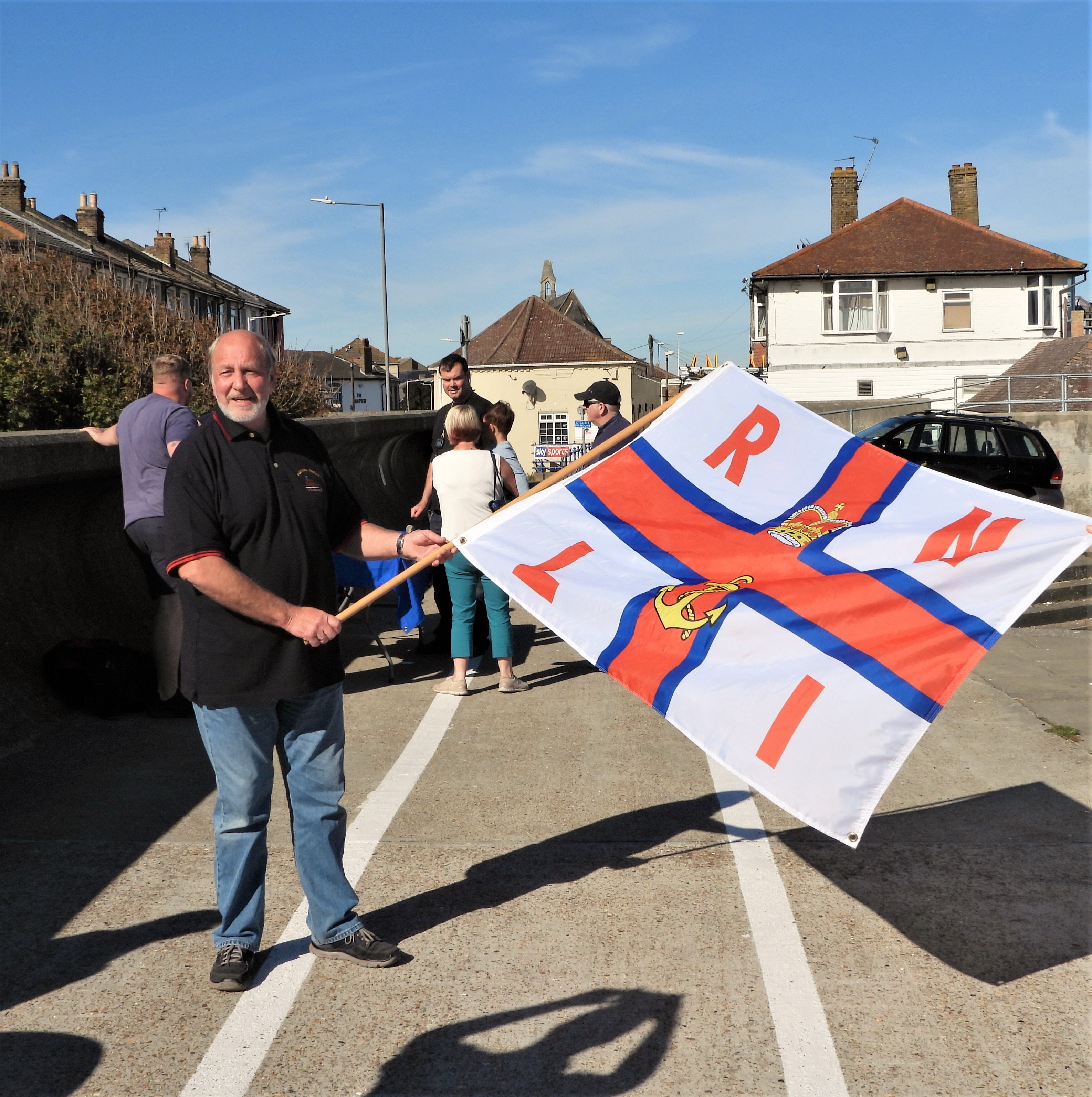 Sheerness full time Coxswain/ Mechanic Robin Castle MBE about to drop the flag for the start of the 27th Sheerness RNLI Lifeboat run.