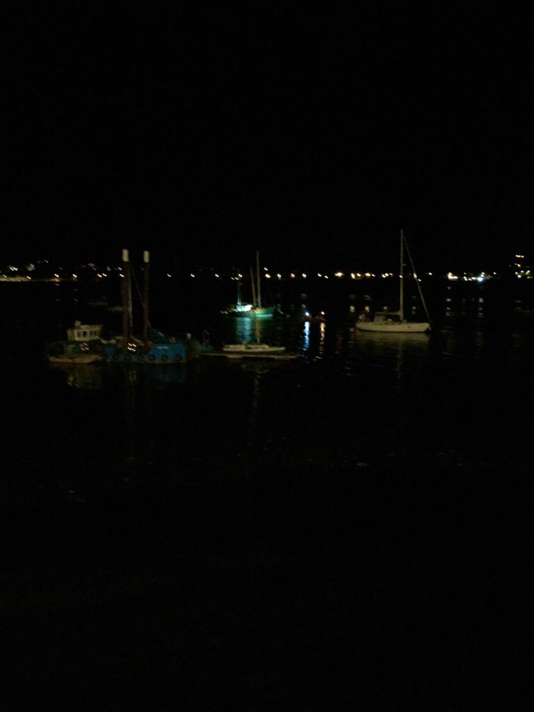 25th September- Lifeboat during search of River Conwy. Dark view of lifeboat searching with lights in the distant.