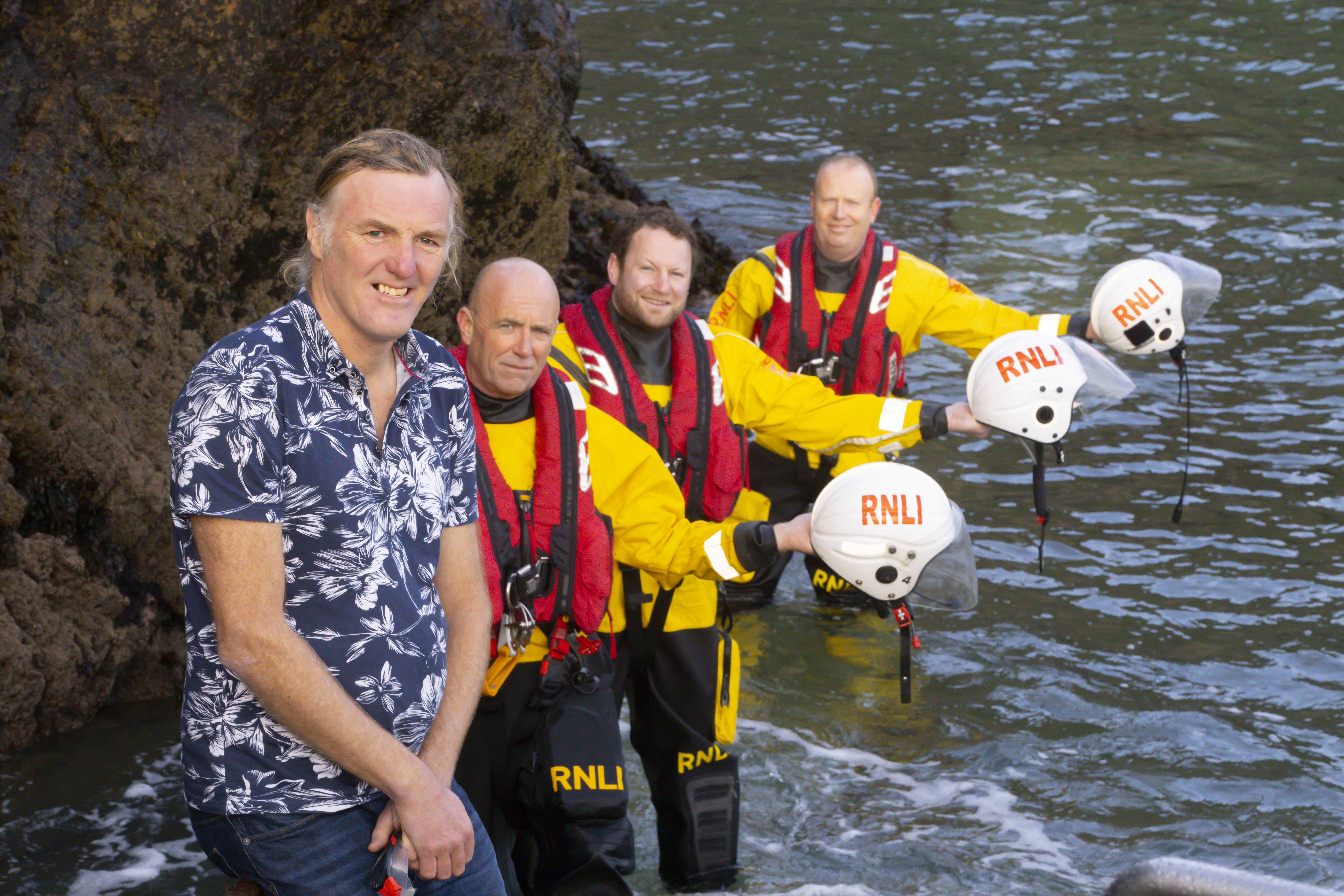 Rescued swimmer Michael Power with Tramore RNLI David McGrath, Alec Fitzmaurice and Fergal McGrath