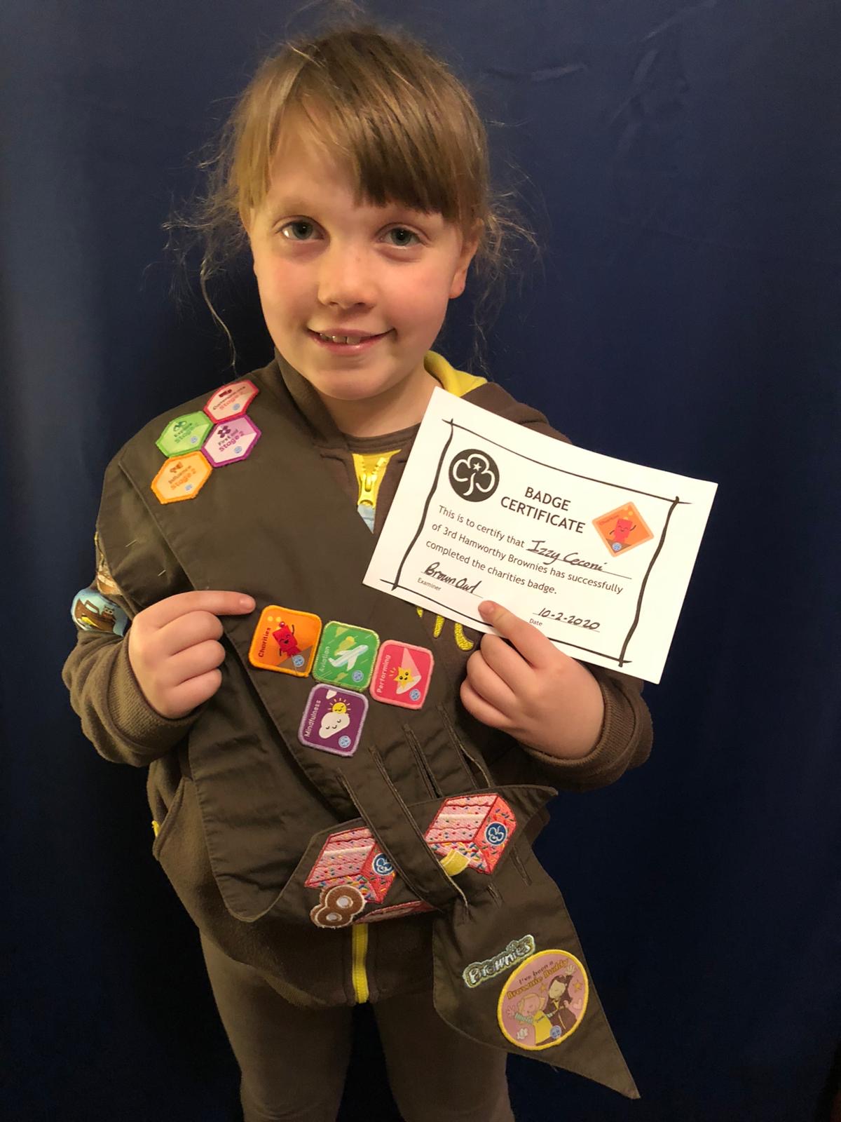Izzy earnt her charity brownie badge