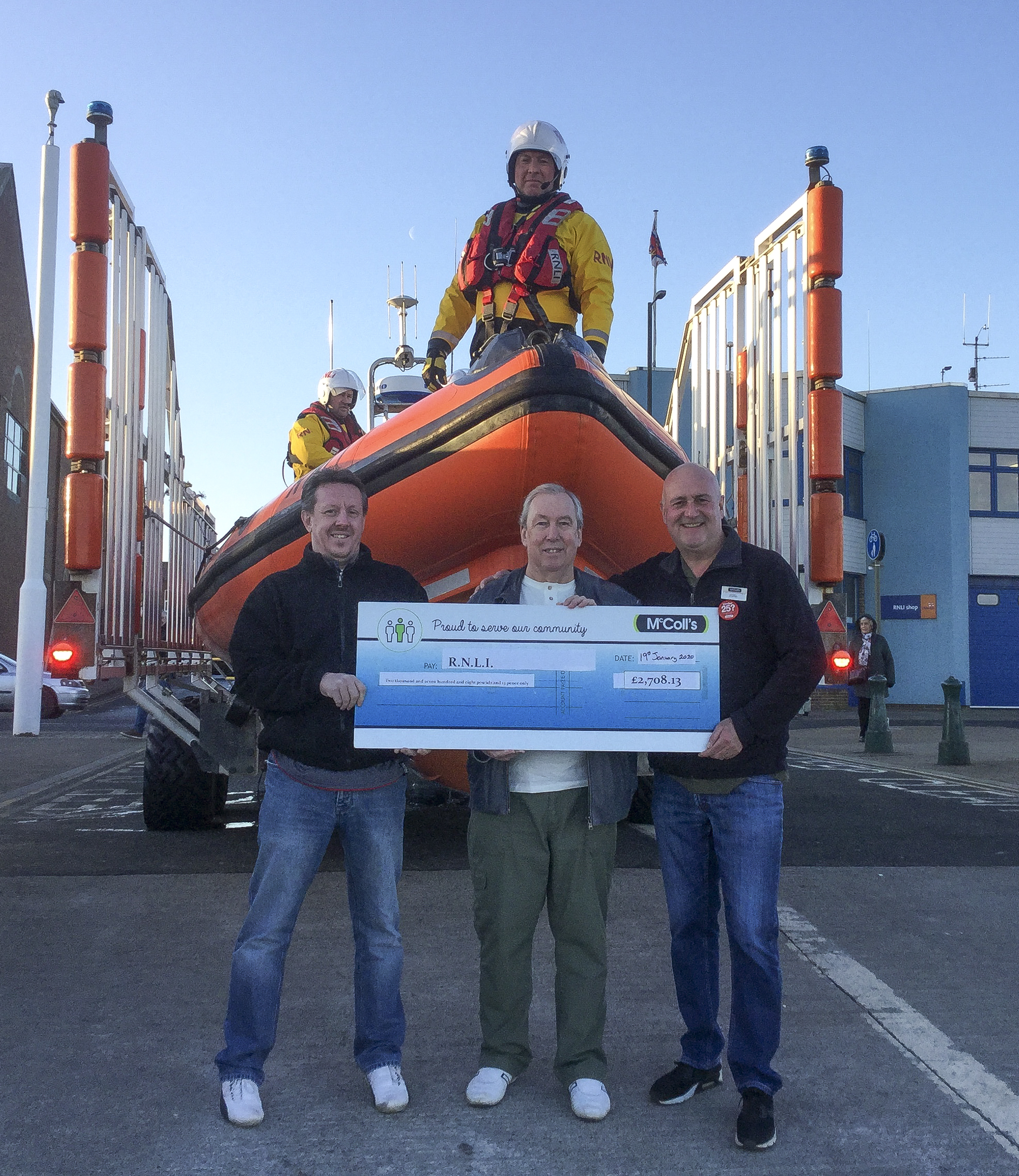 McColl's representatives presenting the donation to the Redcar lifeboat station
