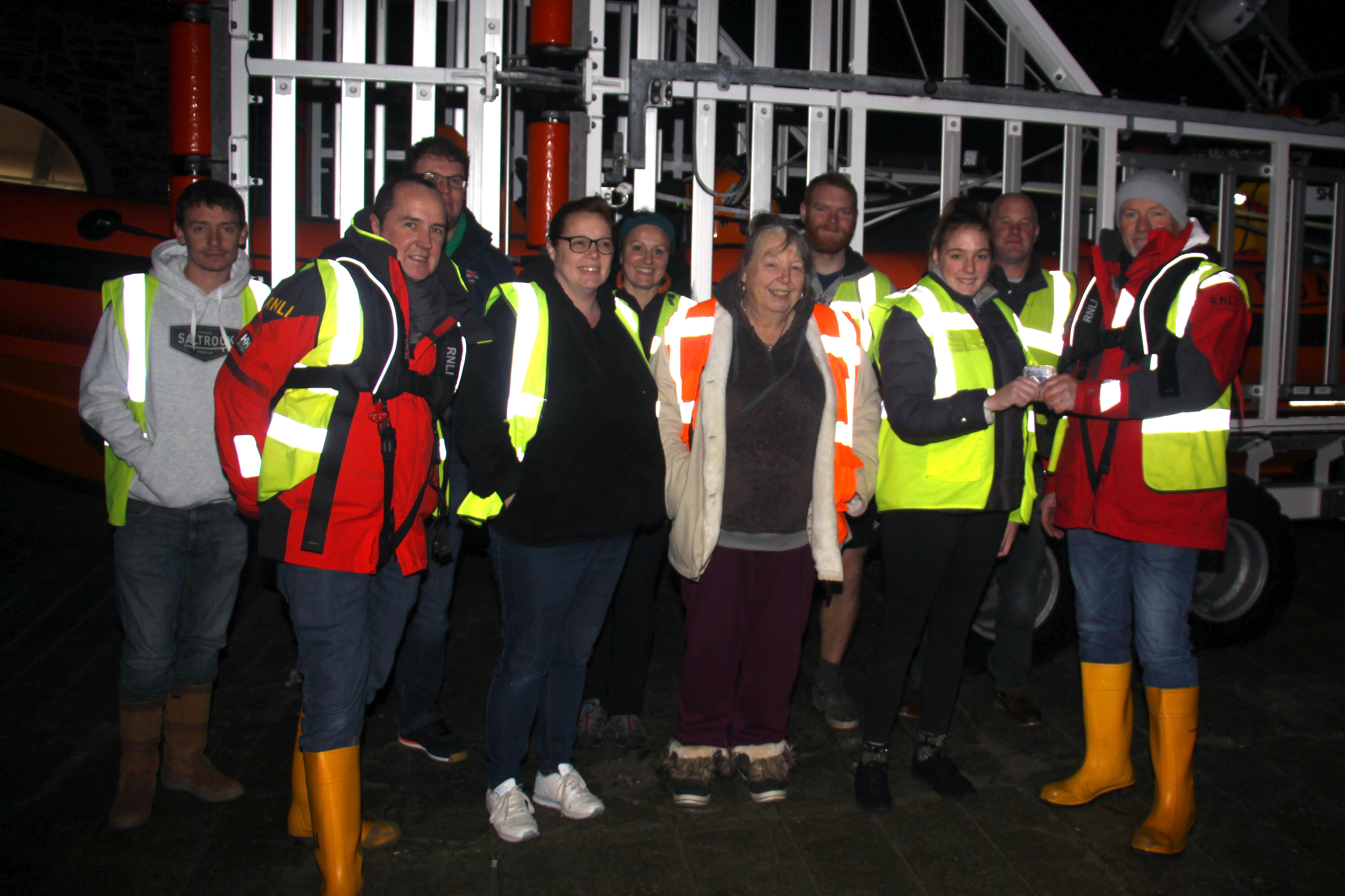 Simon Rawe accepting the donation from Kate Marsh, Sue Marsh and Suzie Bowden and Looe RNLI volunteer crew (2)