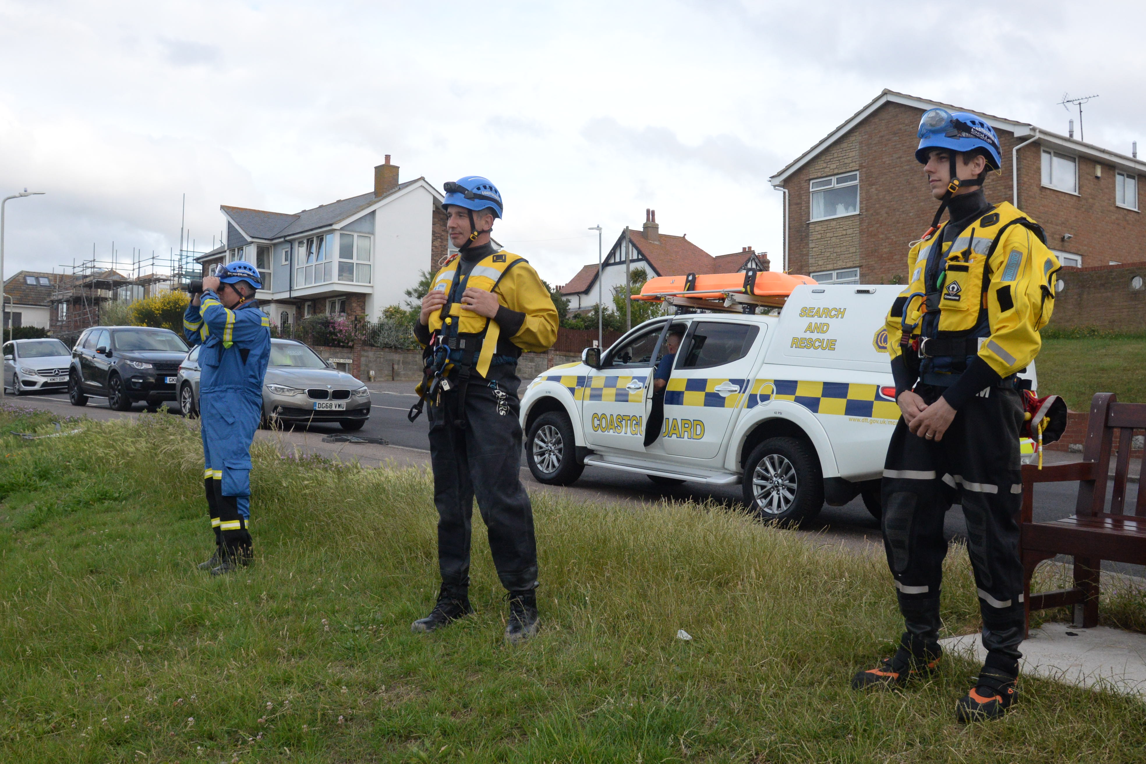 Photo of members of the Herne Bay Coastguard Rescue Team keeping watch on a yacht drifting off Herne Bay on Saturday.