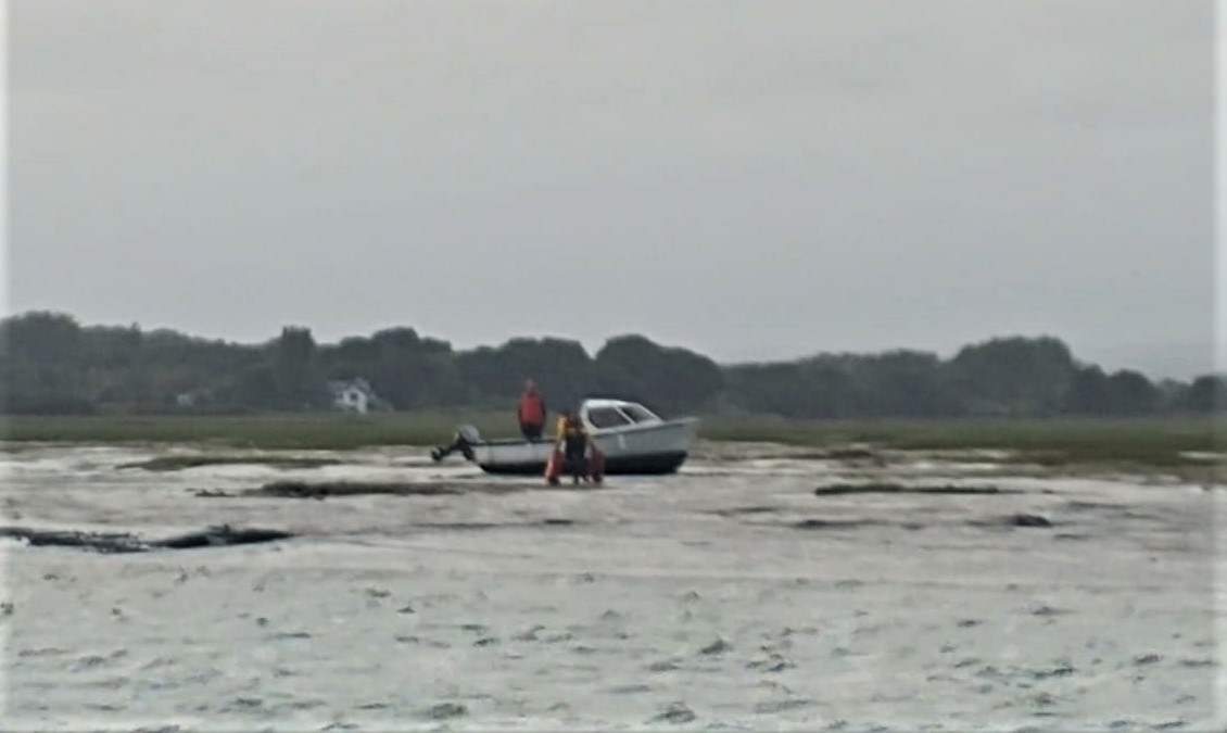 Shot of the vessel aground on the mud.