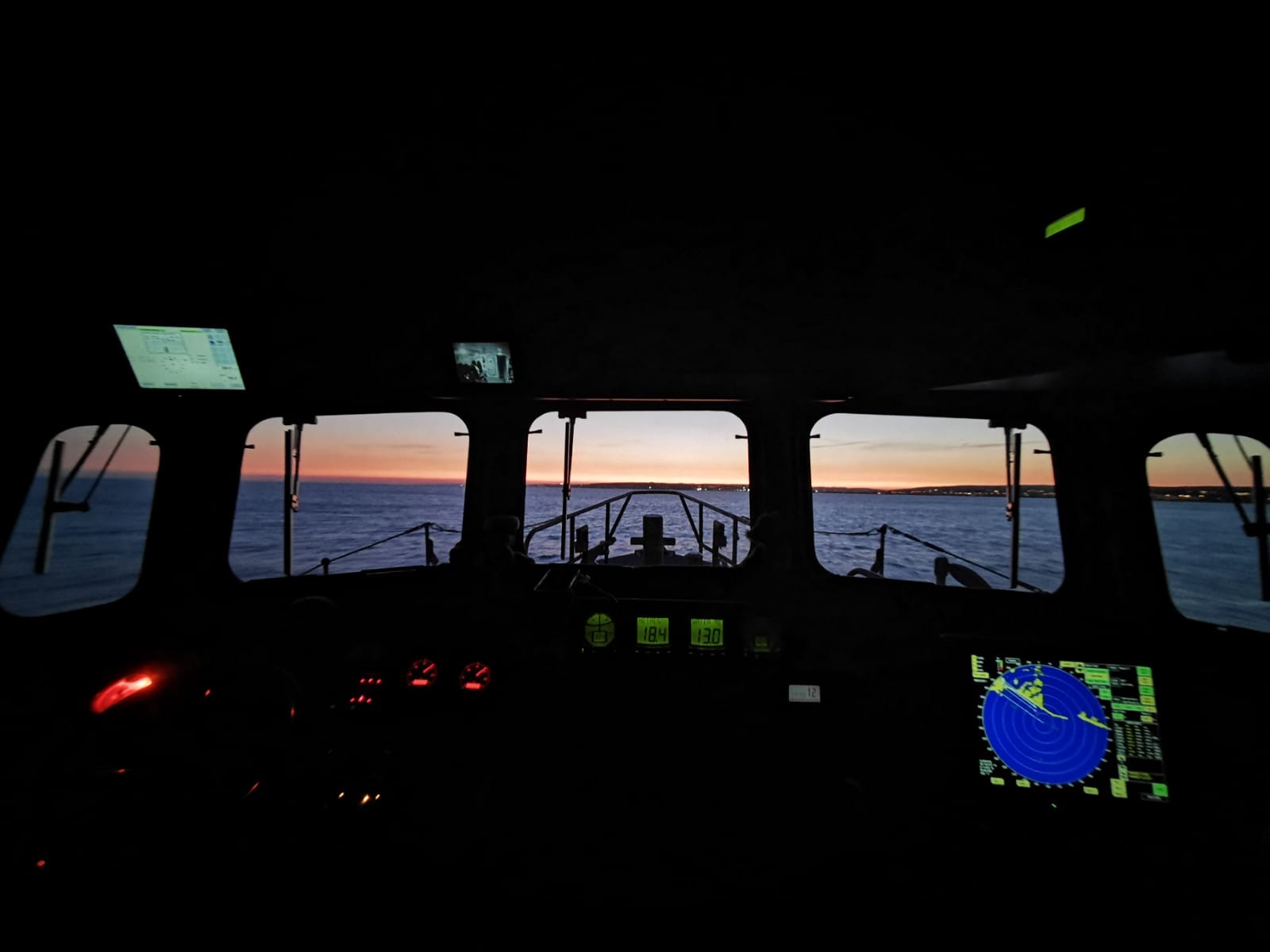 View of dusk horizon from interior of Newhaven Lifeboat.