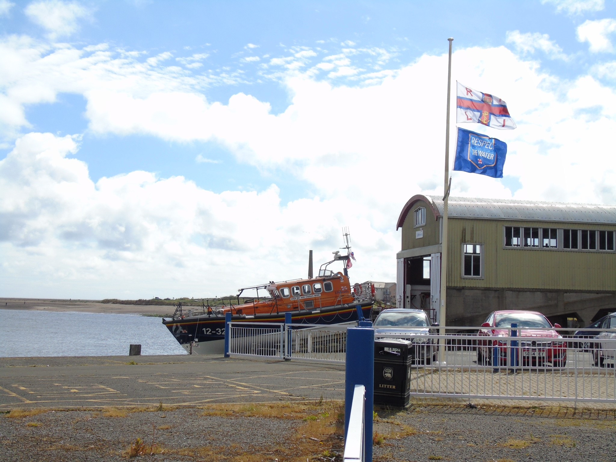 Lifeboat station flag flying at half-mast in memory of former crewman Douglas Blackhall.