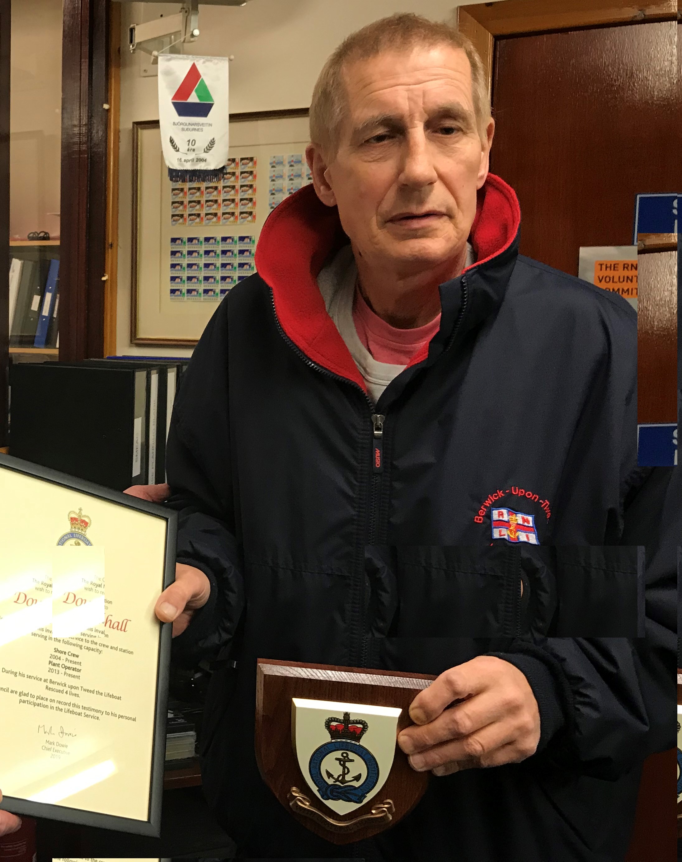 Douglas Blackhall receiving his long service award