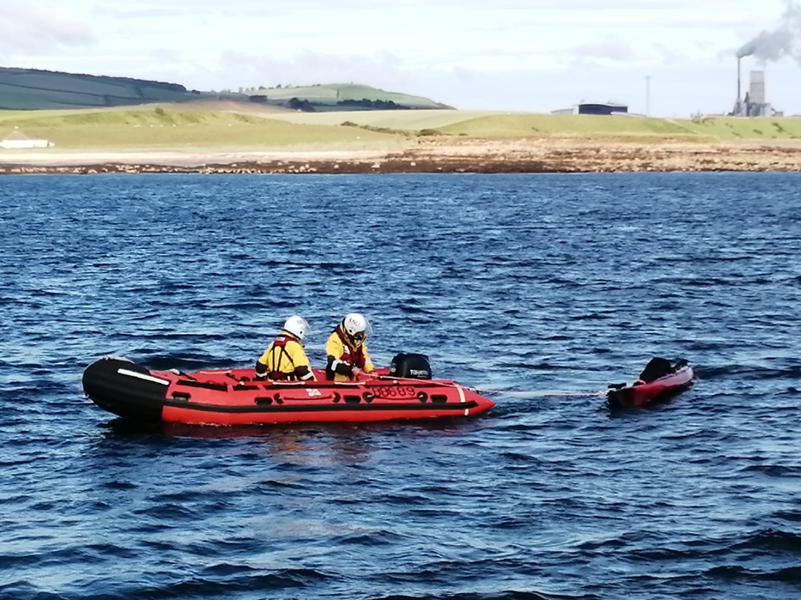 Dunbar’s ALB boarding boat crew assist in the recover of the kayak during this morning’s incident