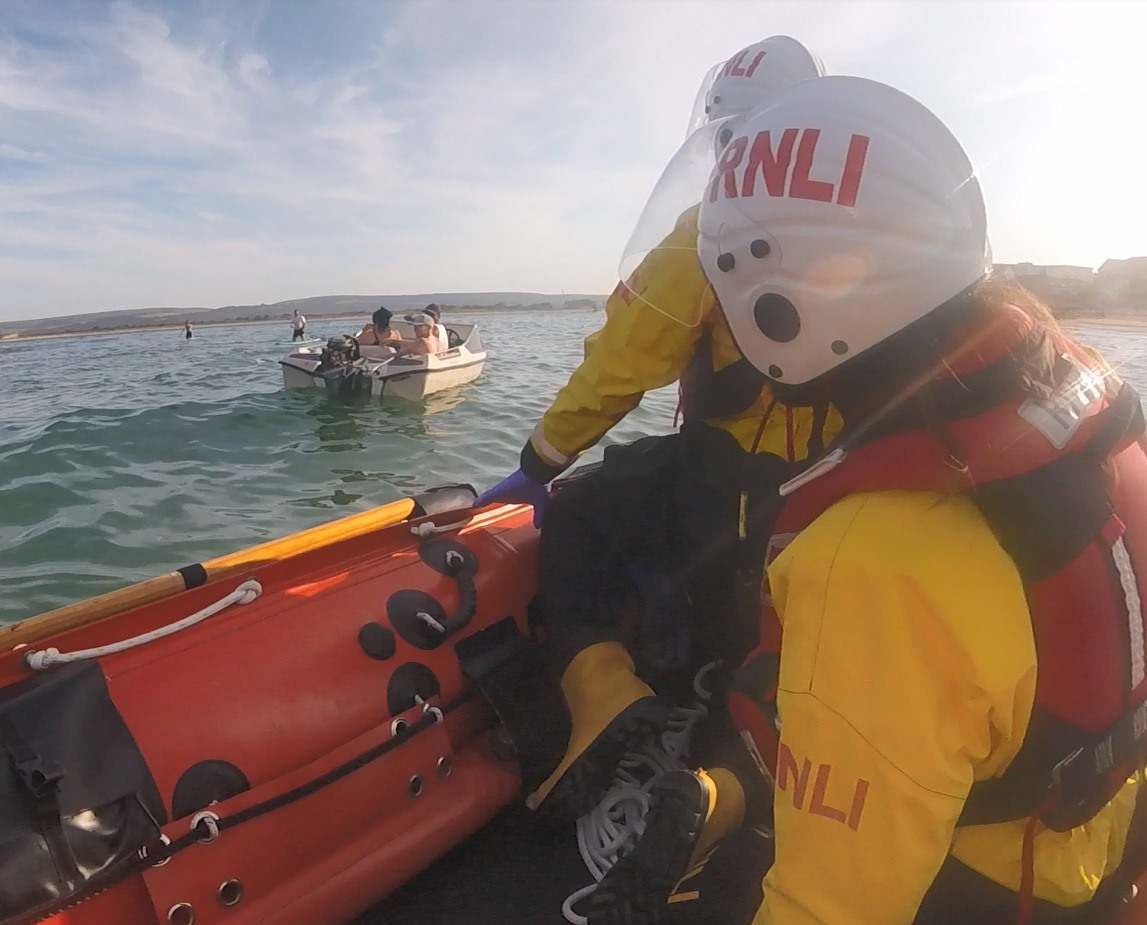 Lifeboat assisting Speedboat that had broken down 
