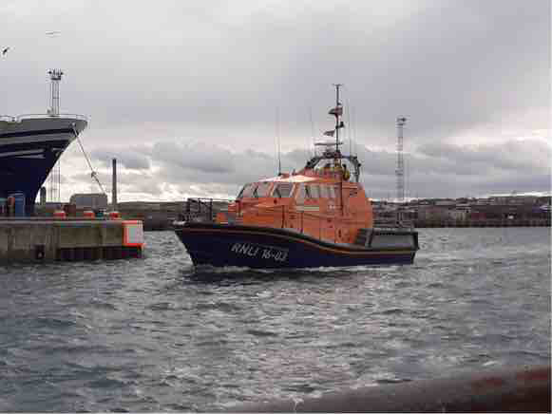 Peterhead's all-weather lifeboat returning to station soon after the tasking by the UK Coastguard to a reported capsized yacht