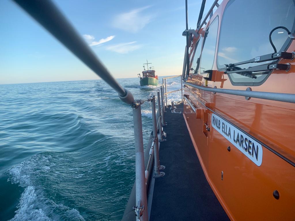 Fishing vessel under tow 