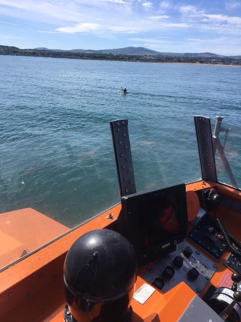 ESCORTING 2 ND KAYAKER TO BEACH