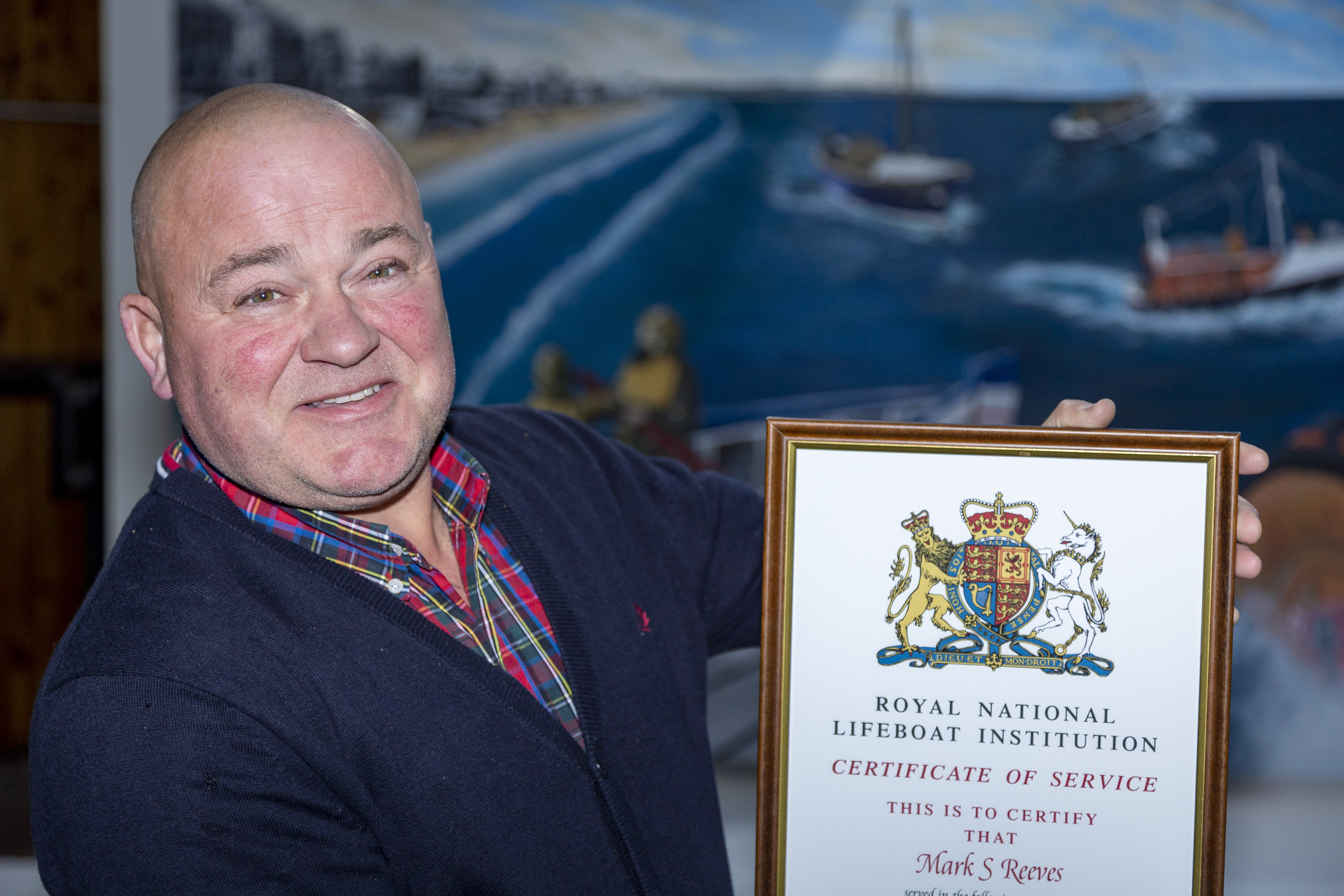 Mark Reeves with his service record