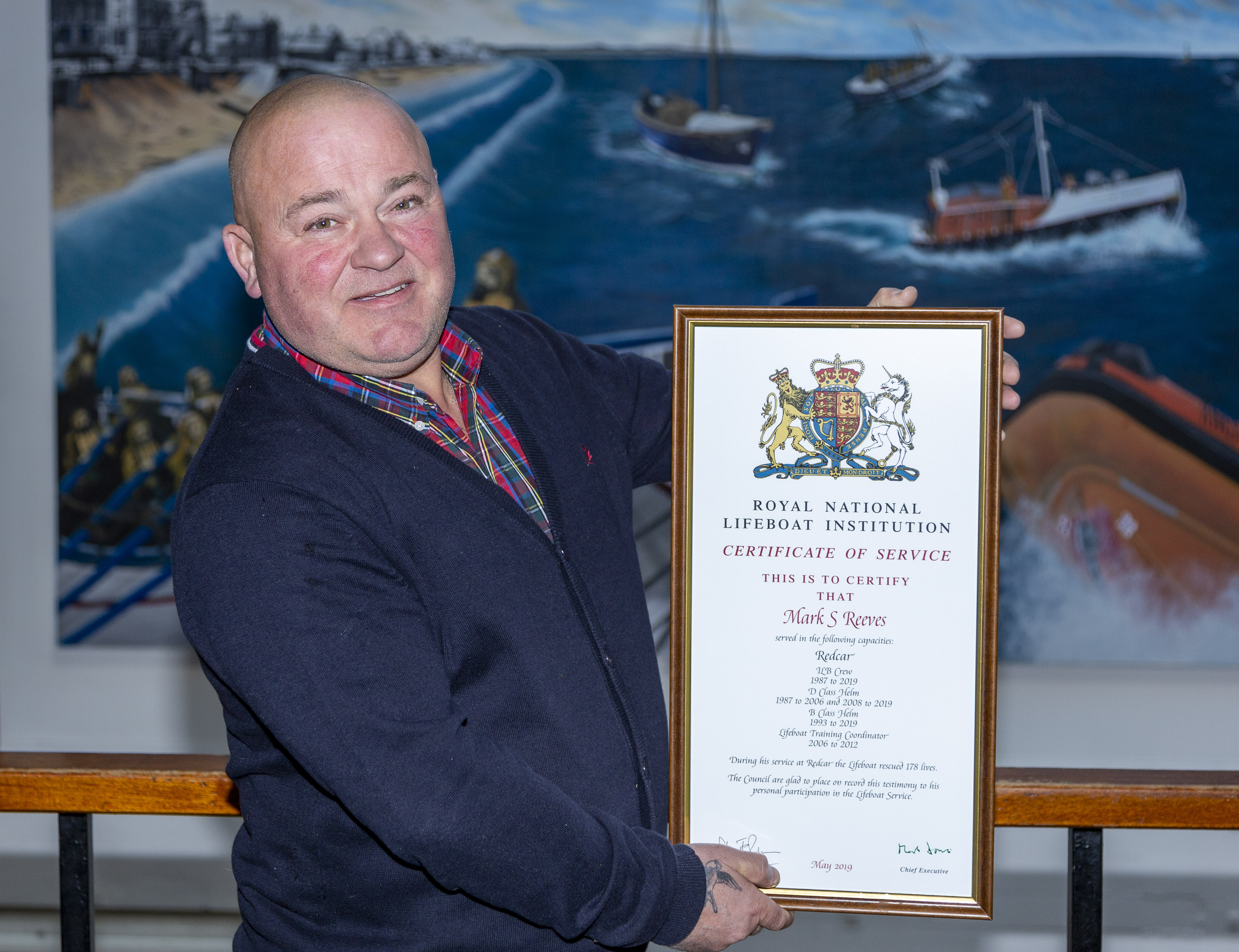 Mark Reeves with his service record