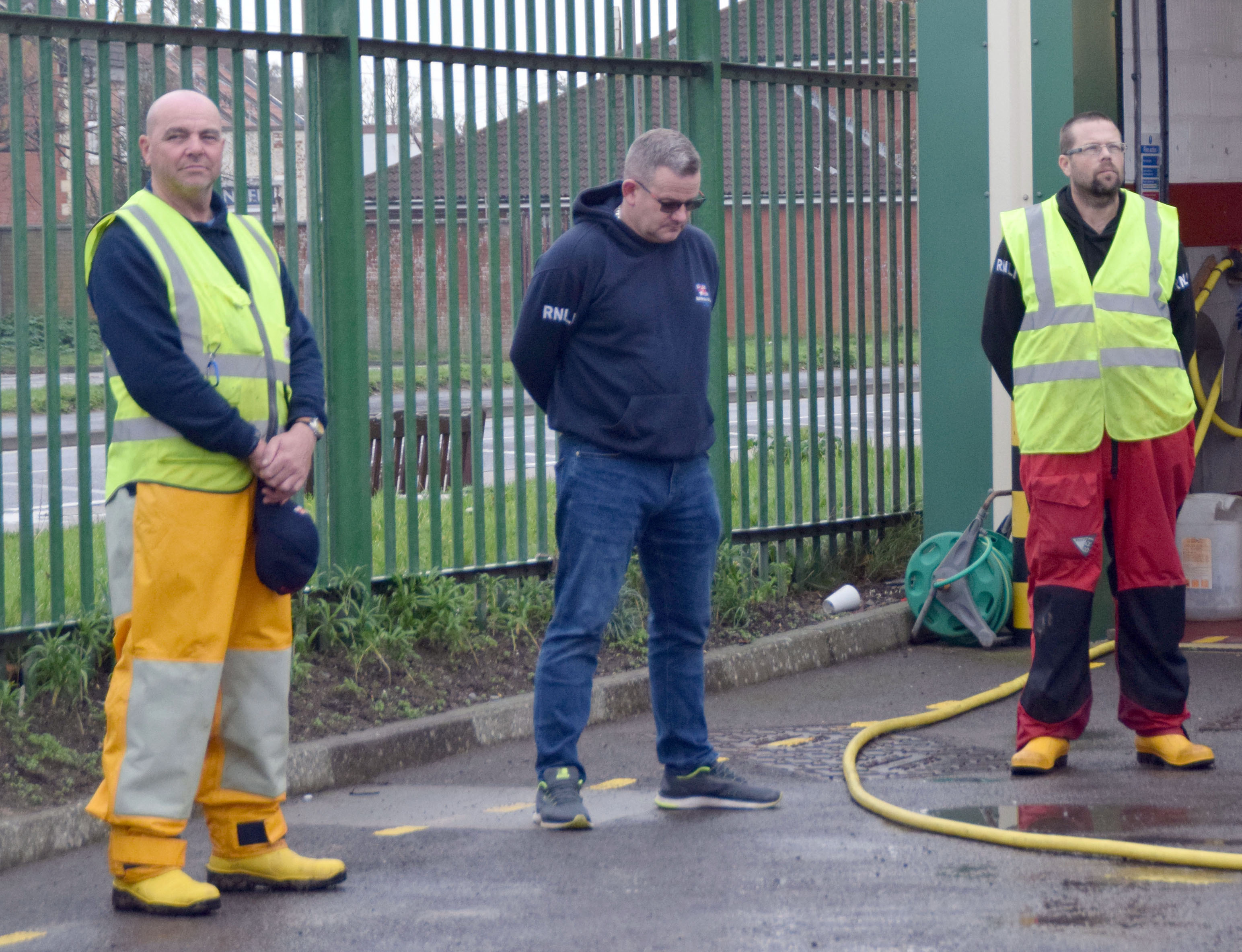 Crewmembers assembled in the station yard