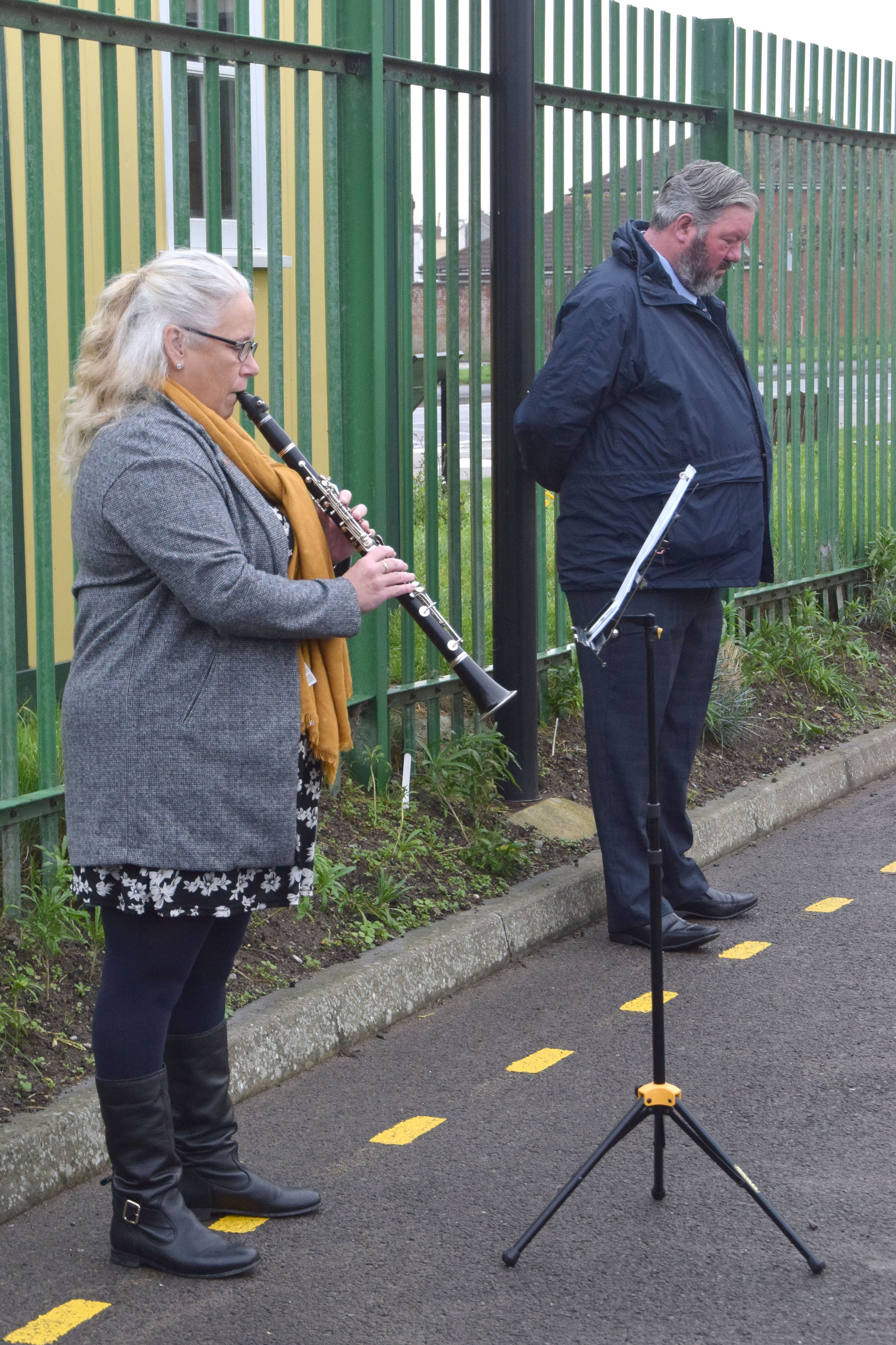 Julie Baker plays 'the last post' on her clarinet