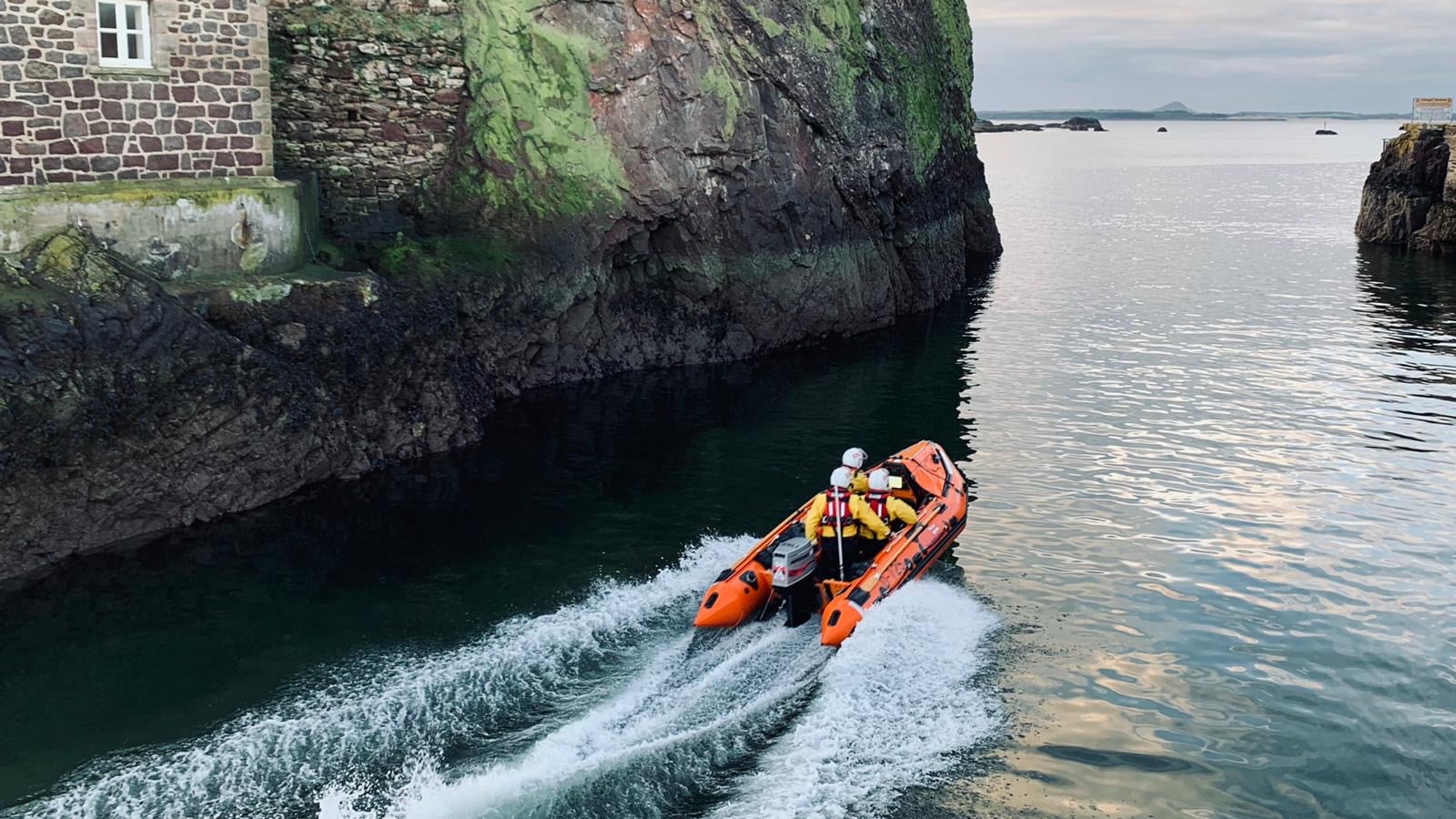 Photo shows D-class lifeboat exiting Dunbar harbour.
