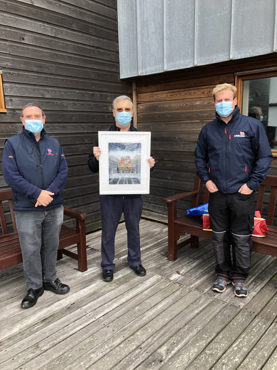 Painting being accepted by RNLI Cromer