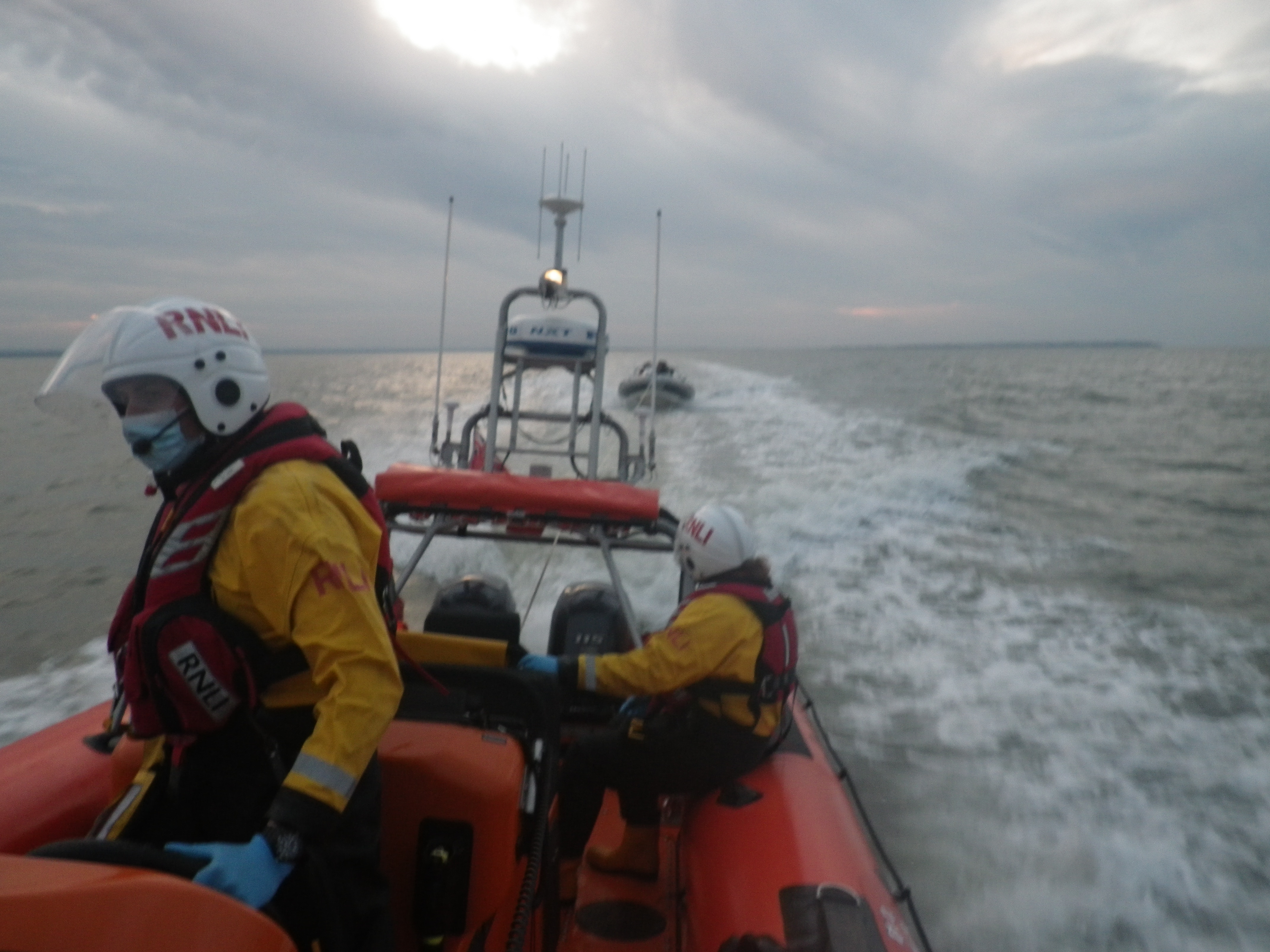 The Whitstable Atlantic 85 lifeboat 'Lewisco' tows the 6-metre RIB and it's three occupants ashore at Herne Bay after the craft broke down off Whitstable on Monday afternoon.