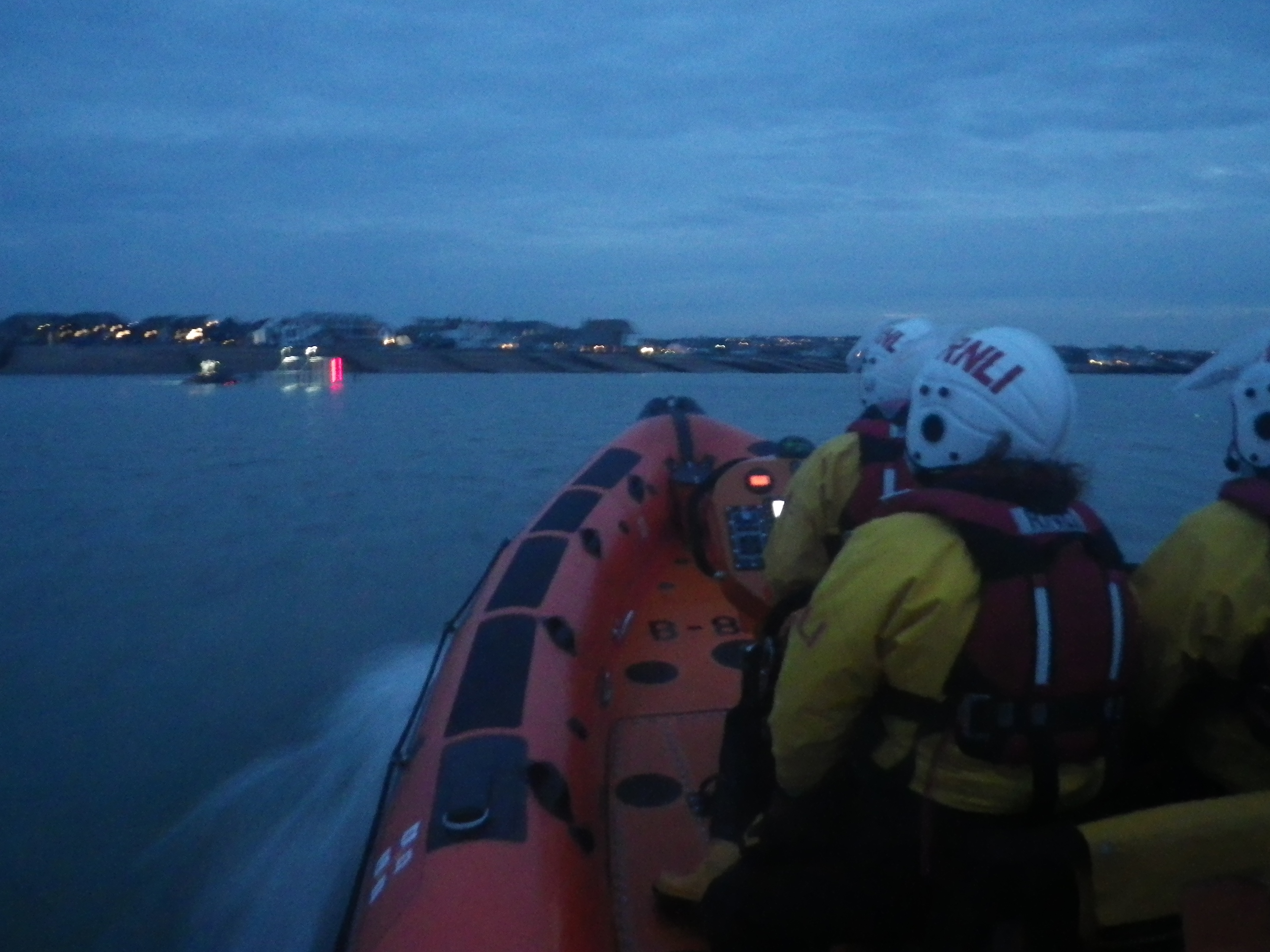The Whitstable Atlantic 85 lifeboat 'Lewisco' returns to station after towing a 6-metre RIB and it's three occupants ashore at Herne Bay after the craft broke down off Whitstable on Monday afternoon.