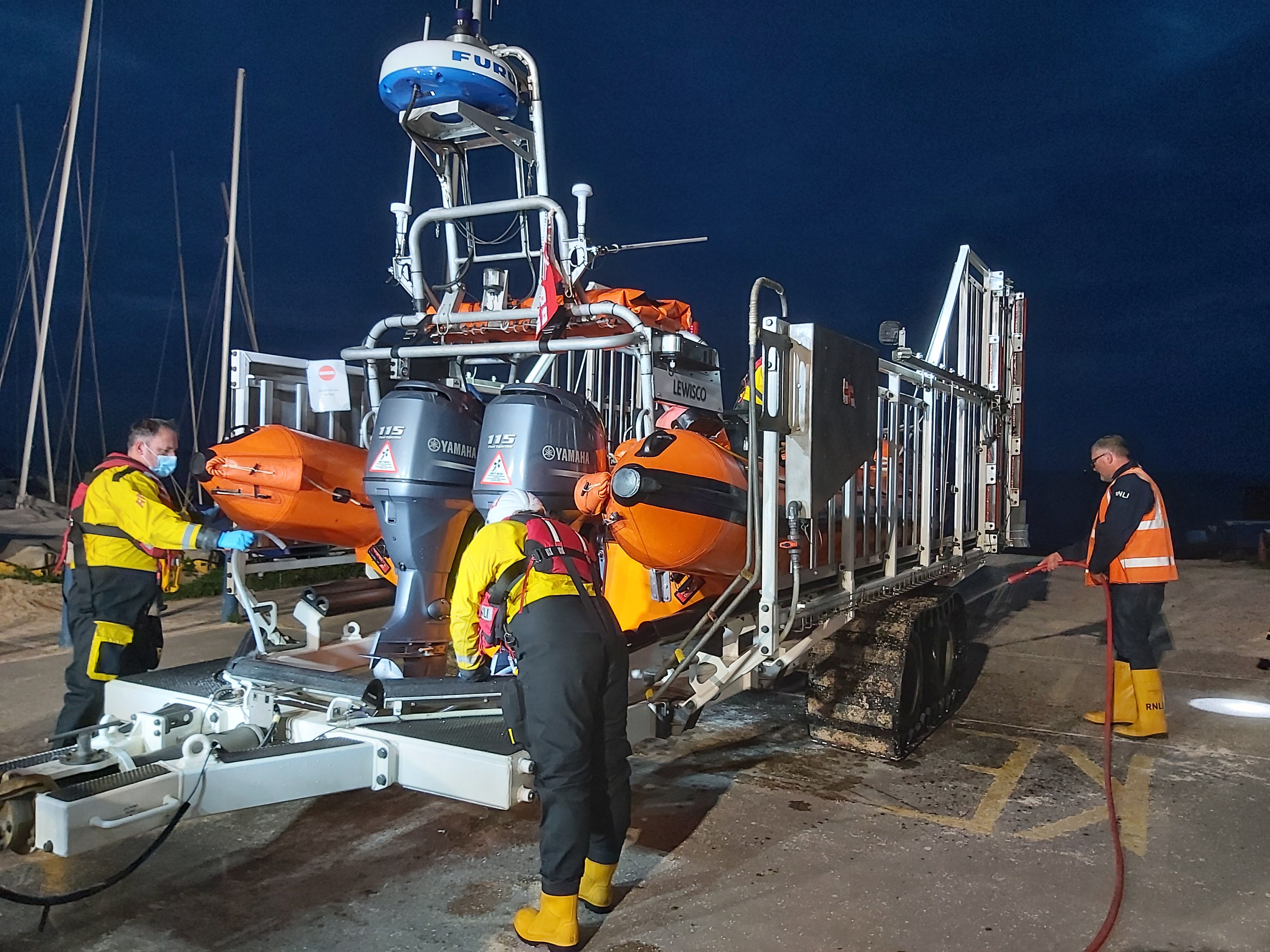 Crew and launchers with the Whitstable Atlantic 85 lifeboat 'Lewisco' back 'on station' after towing a 6-metre RIB and it's three occupants ashore at Herne Bay after the craft broke down off Whitstable on Monday afternoon