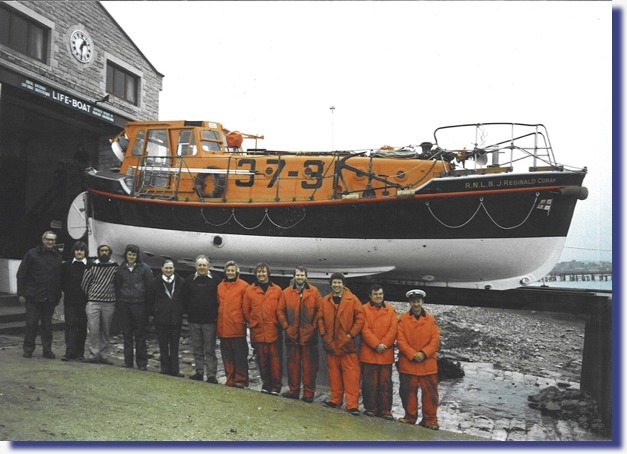 Swanage Lifeboat Crew alonside the J Reginald Corah