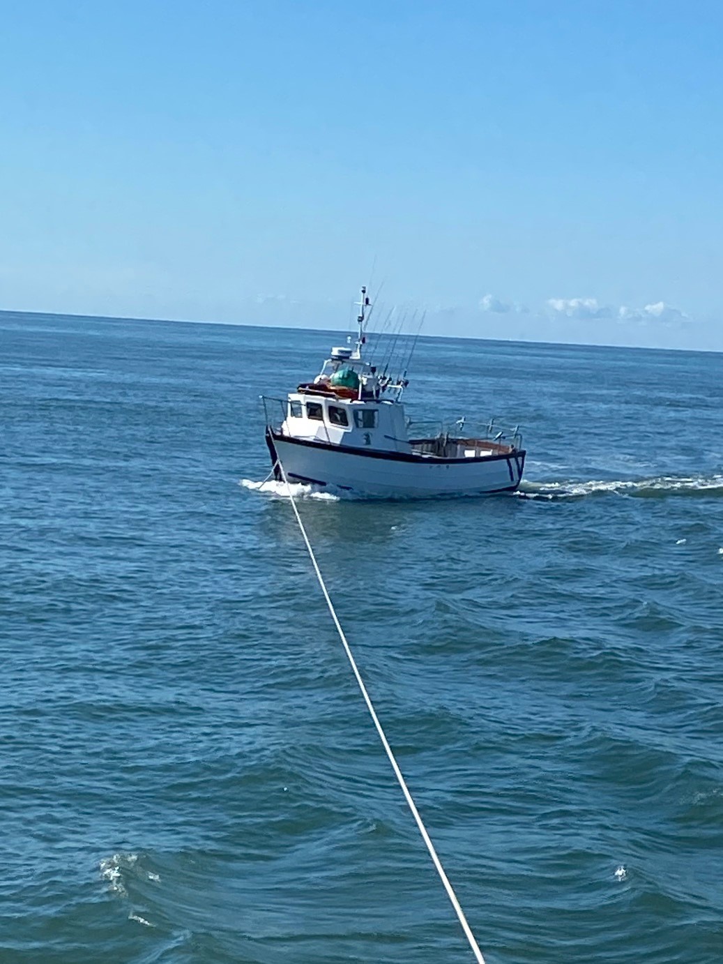 Fishing vessel being towed by Ilfracombe lifeboat