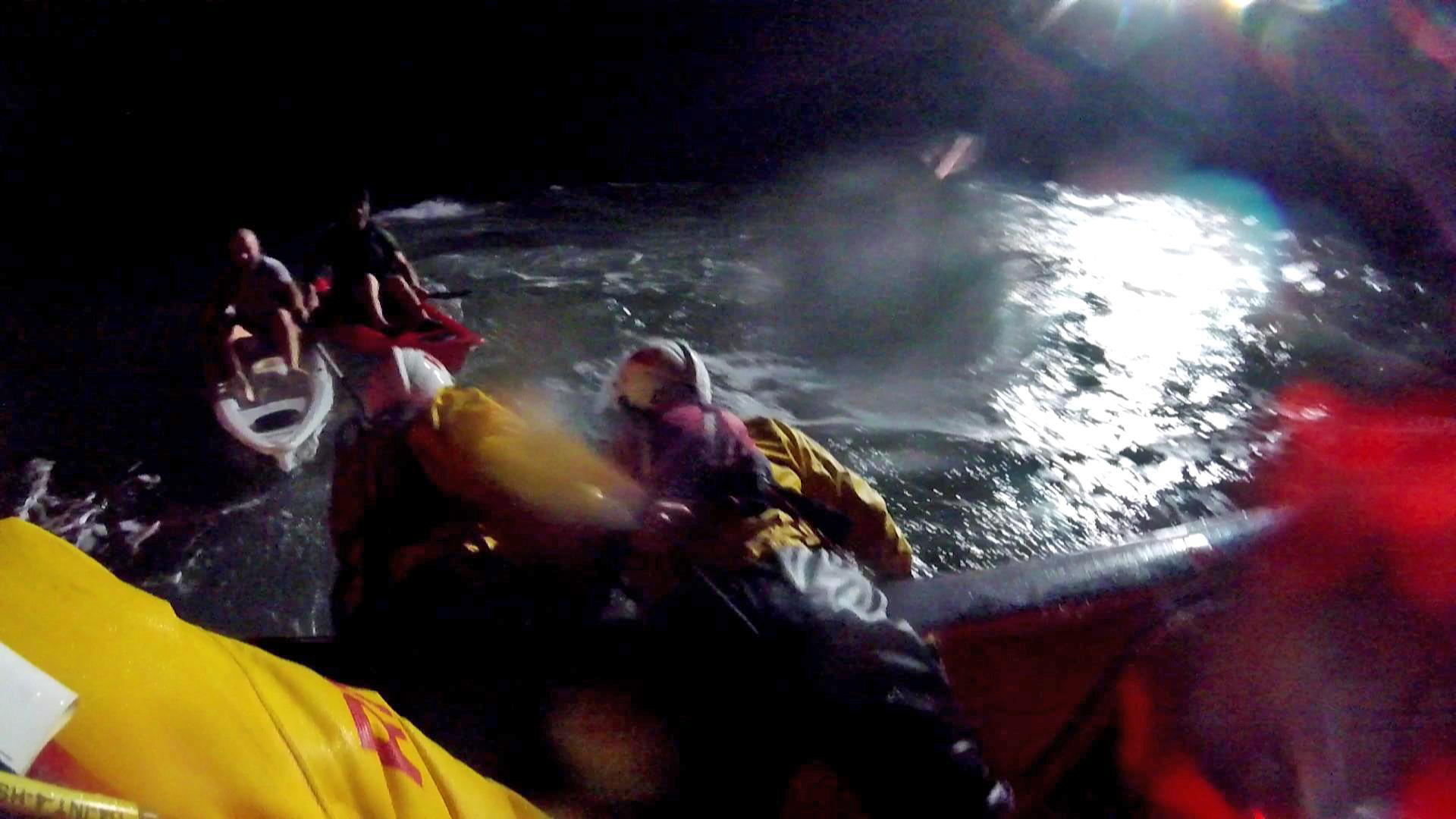 Two exhausted kayakers are found in the darkness by the RNLI lifeboat crew.