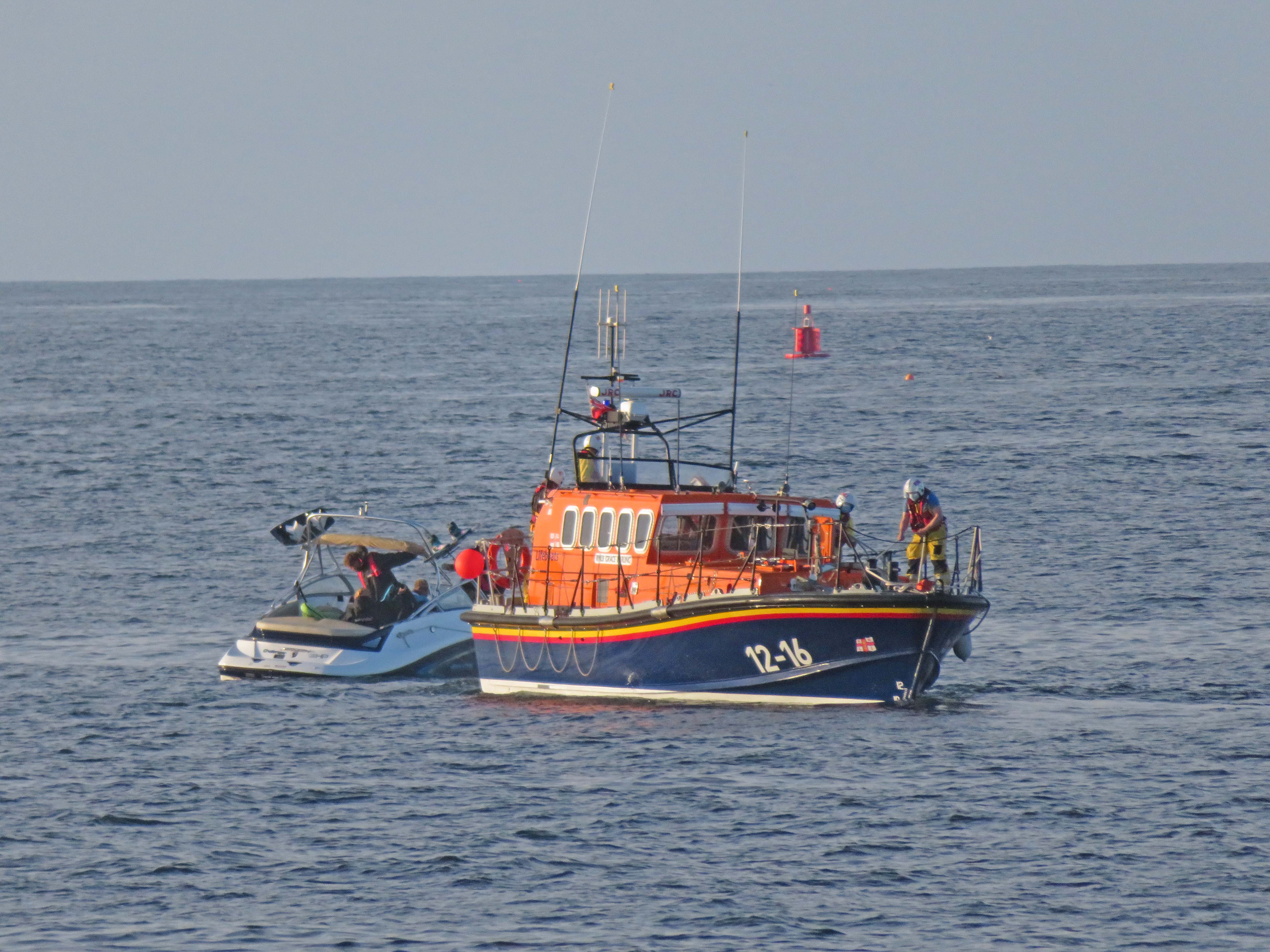 Speedboat under tow