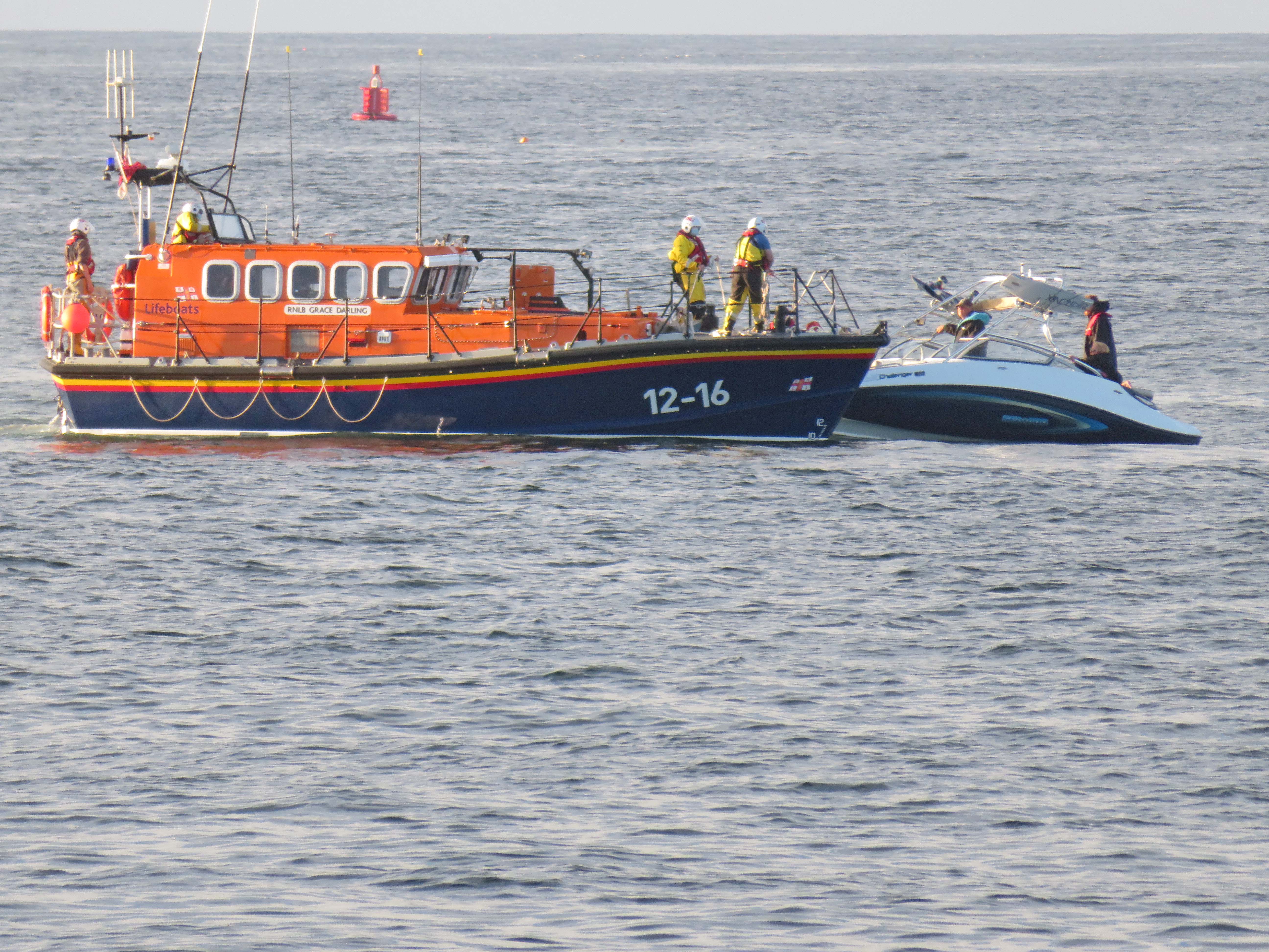 Preparing an alongside tow to enter Seahouses Harbour
