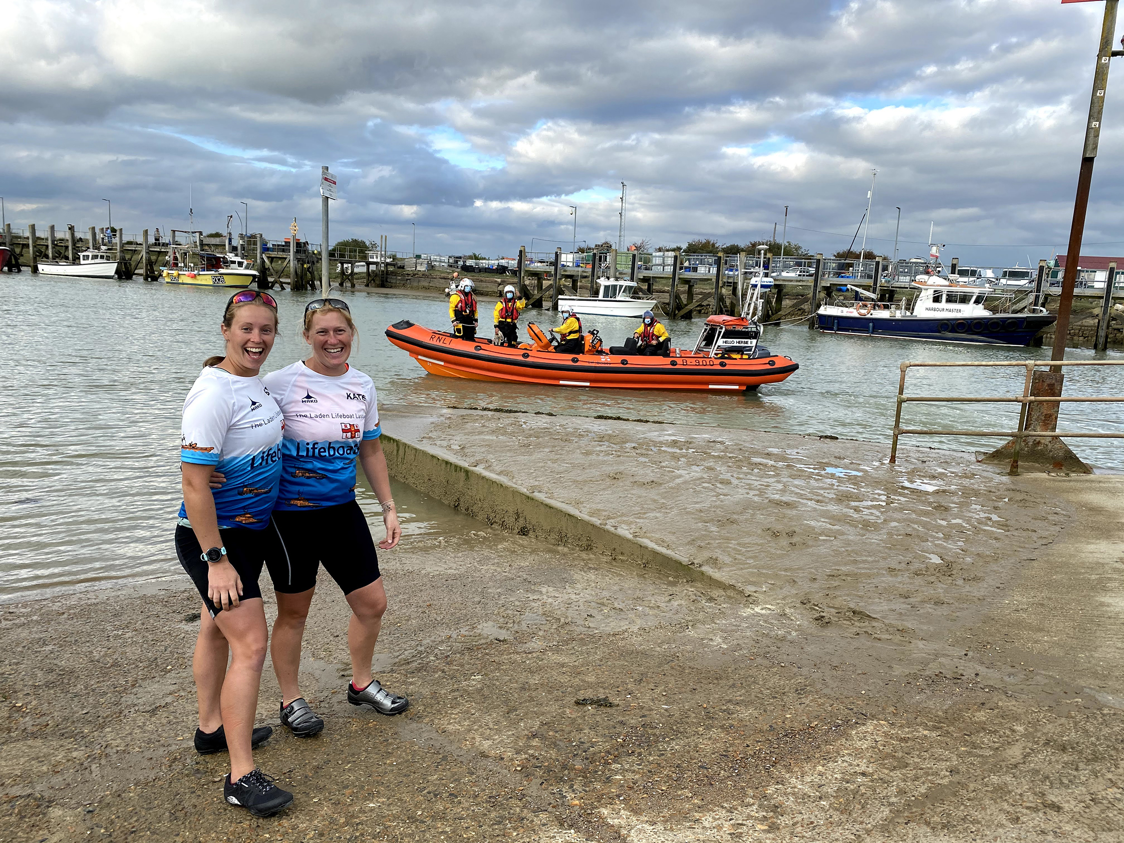Beth and Kate with the Rye Harbour lifeboat in the background.