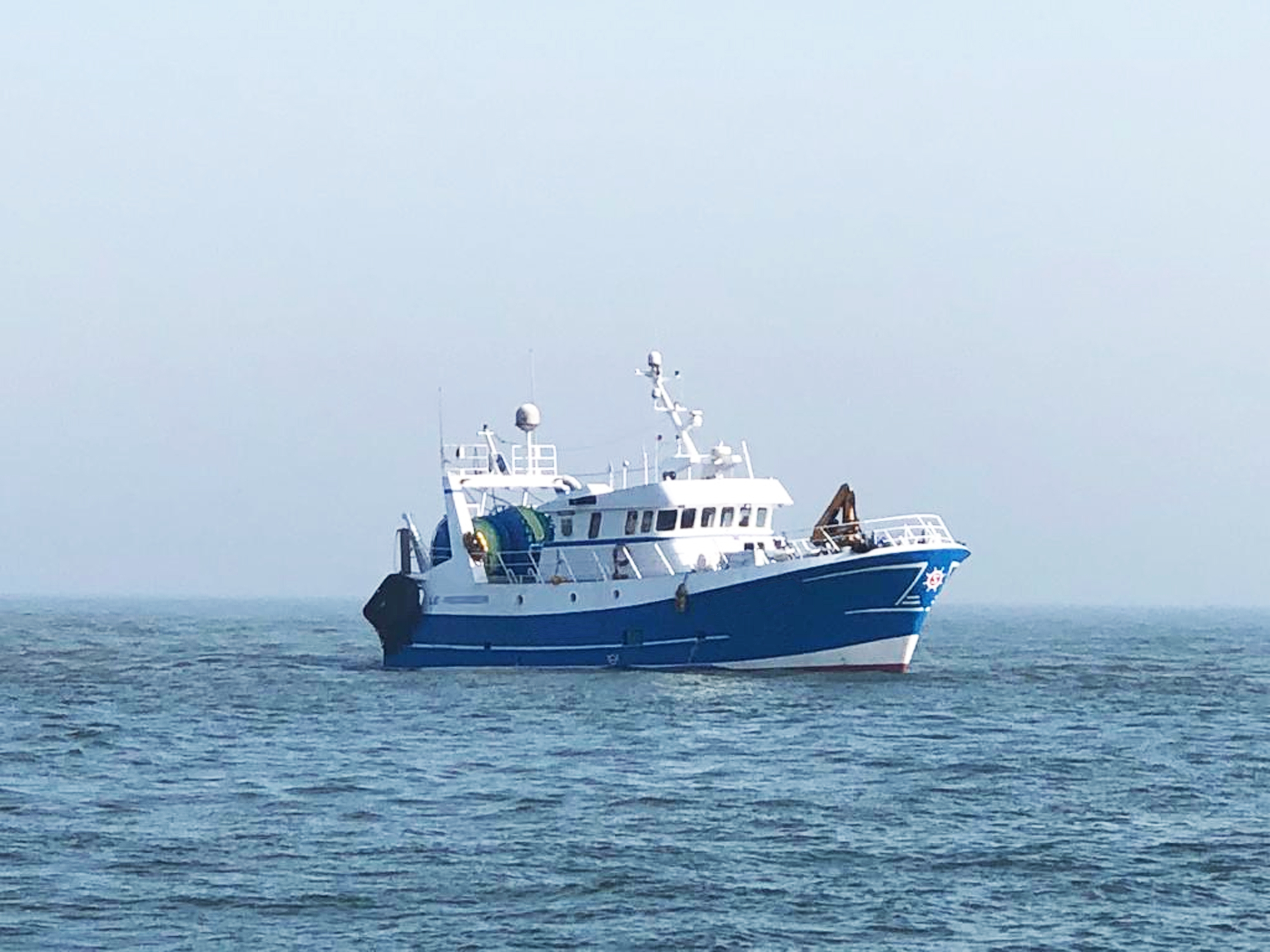 The grounded french trawler awaits the rising tide