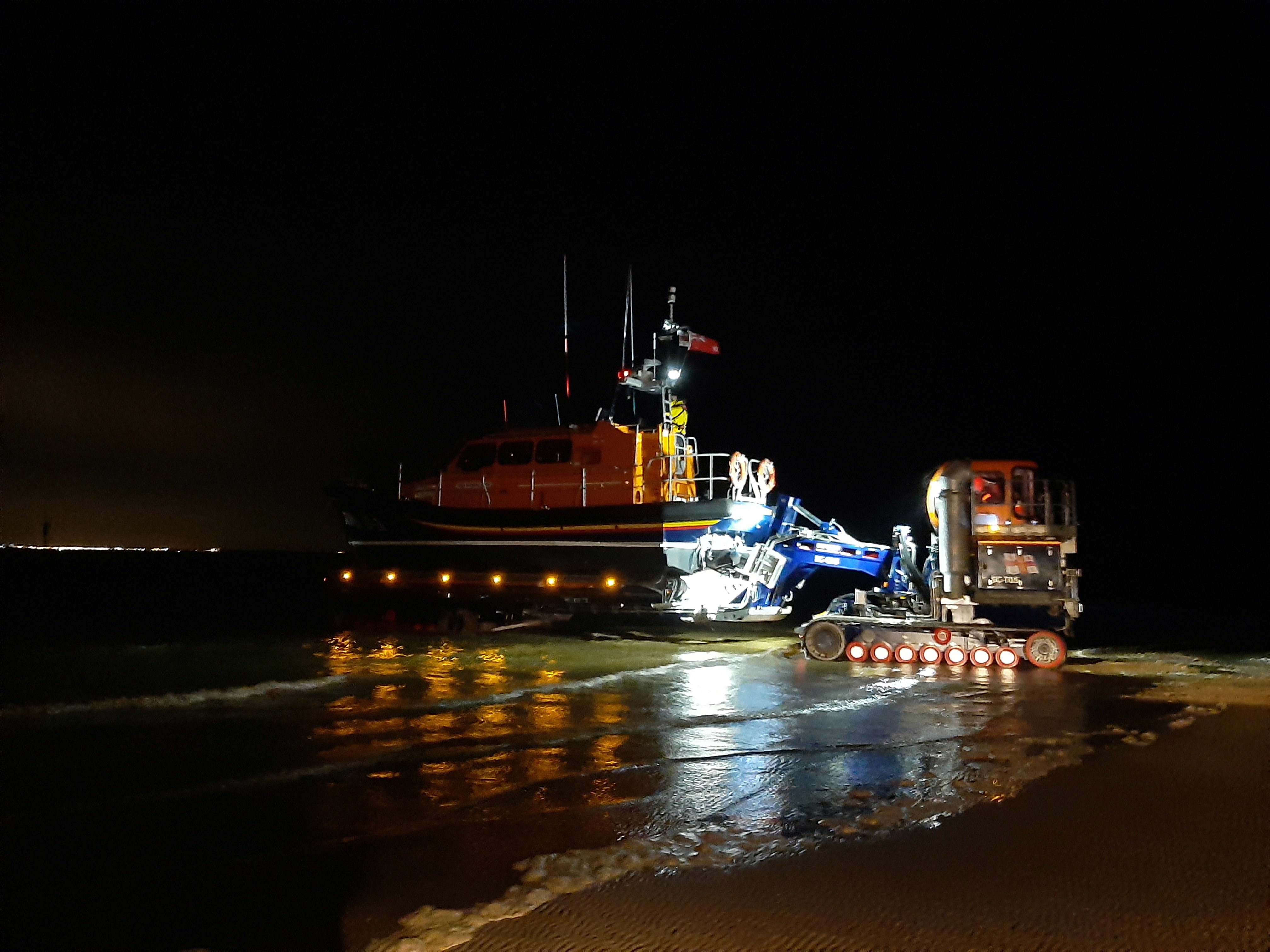 Lytham St Annes Lifeboat Barbara Anne launches into the river at the 11½ mile perch to head for the canal boat.
