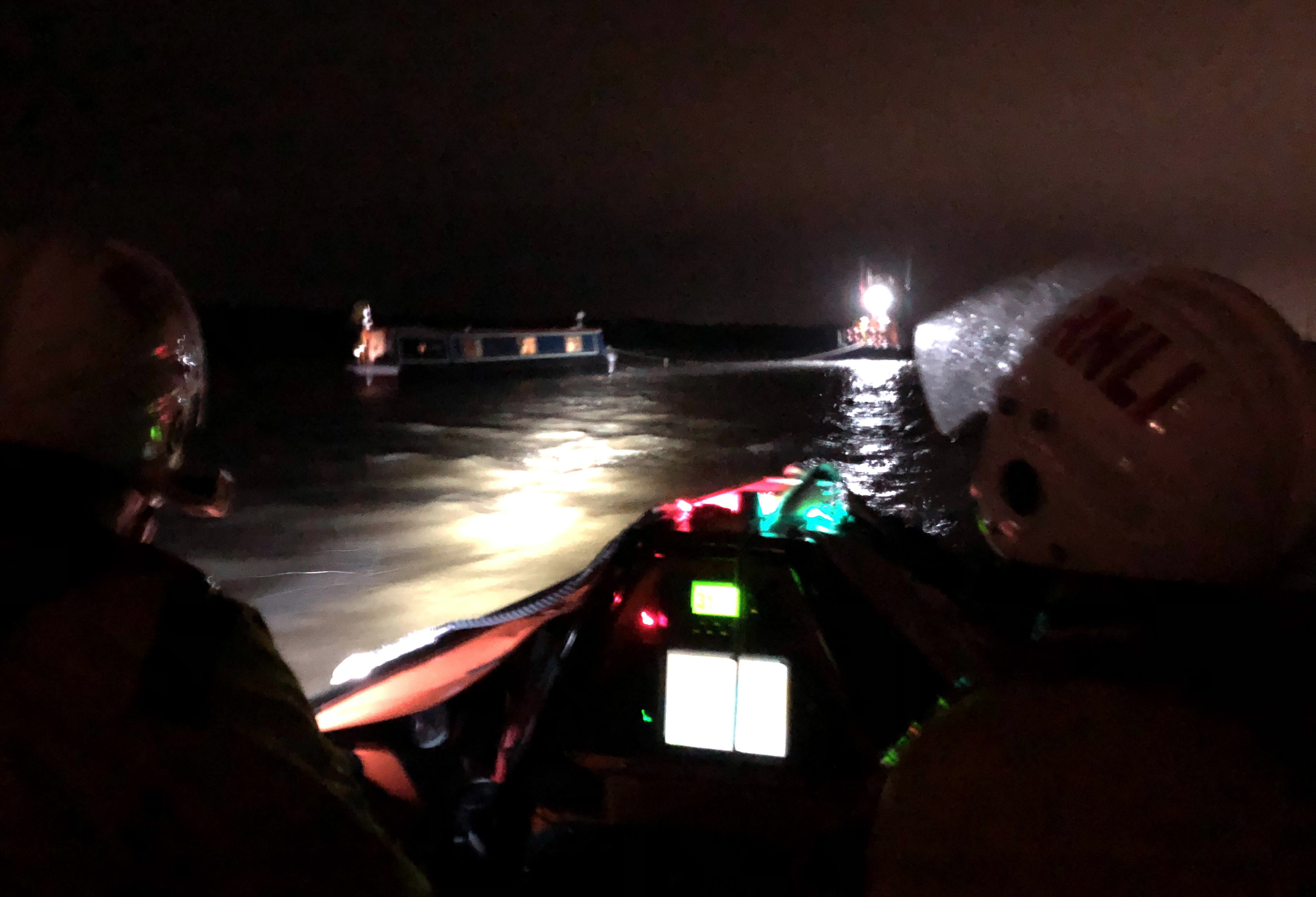 The lifeboats re-float the casualty on the night tide (ILB foreground, casualty centre and ALB rear right).
