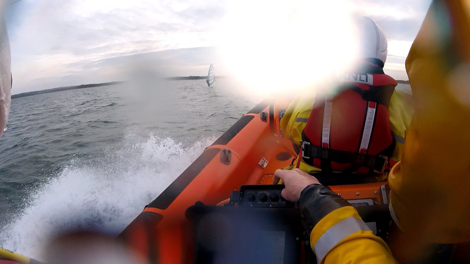 Skerries RNLI approaching the windsurfers