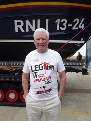 Roy Walker standing in front of the Lytham St Annes lifeboat
