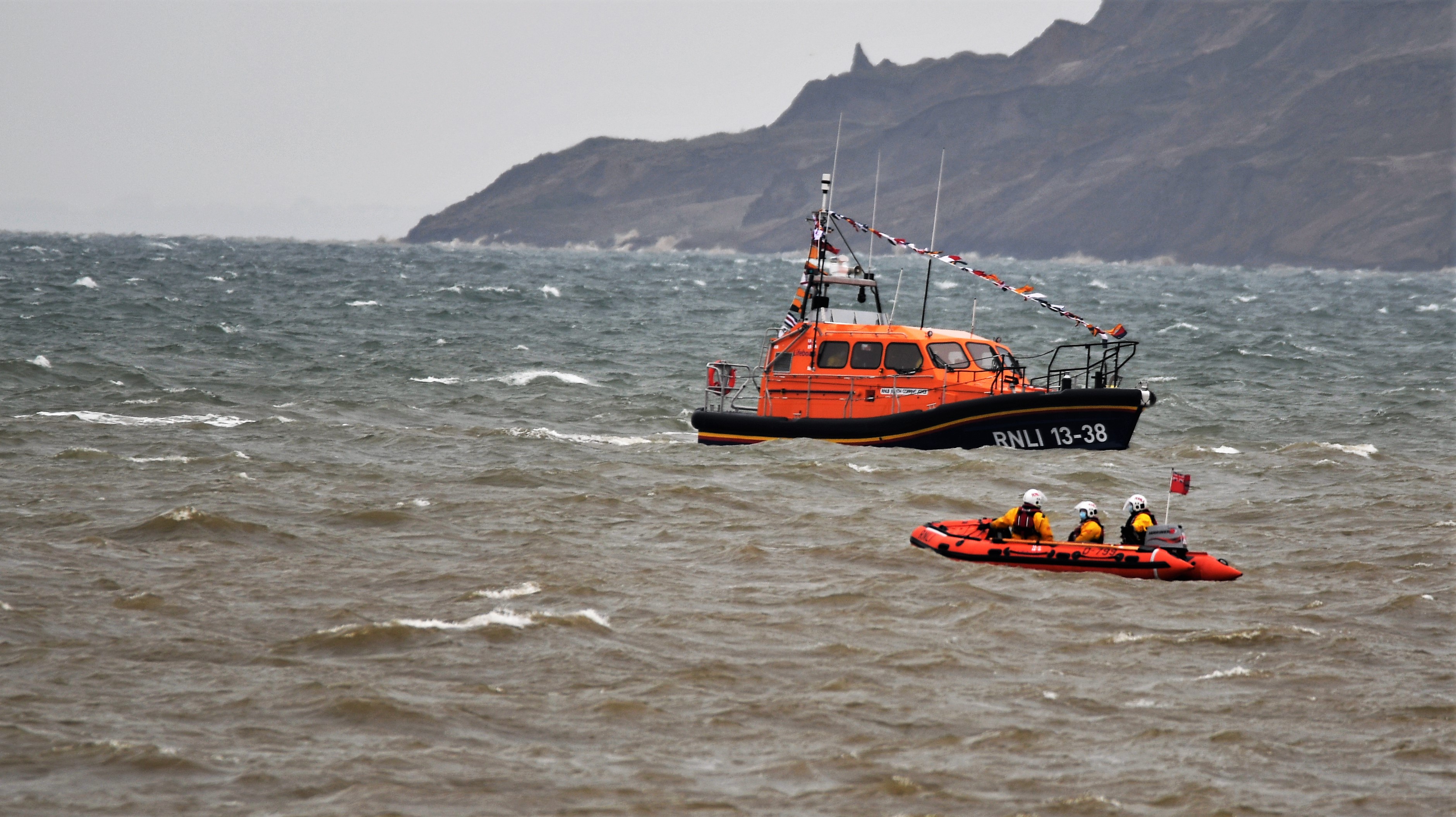 The new Shannon is met by the station's D class ILB 'Buster'.