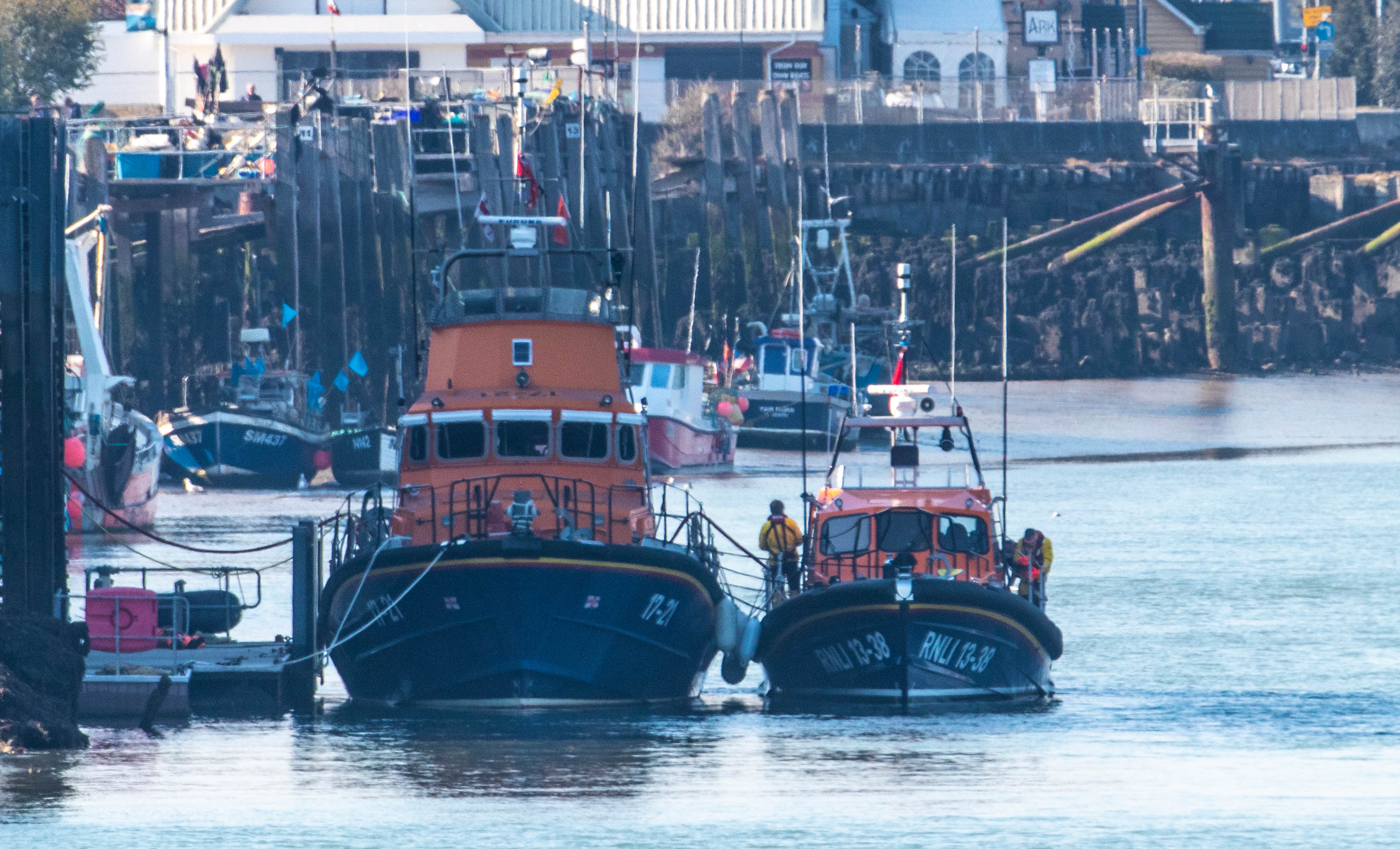 The Shannon moored up alongside the Newhaven Severn class lifeboat.