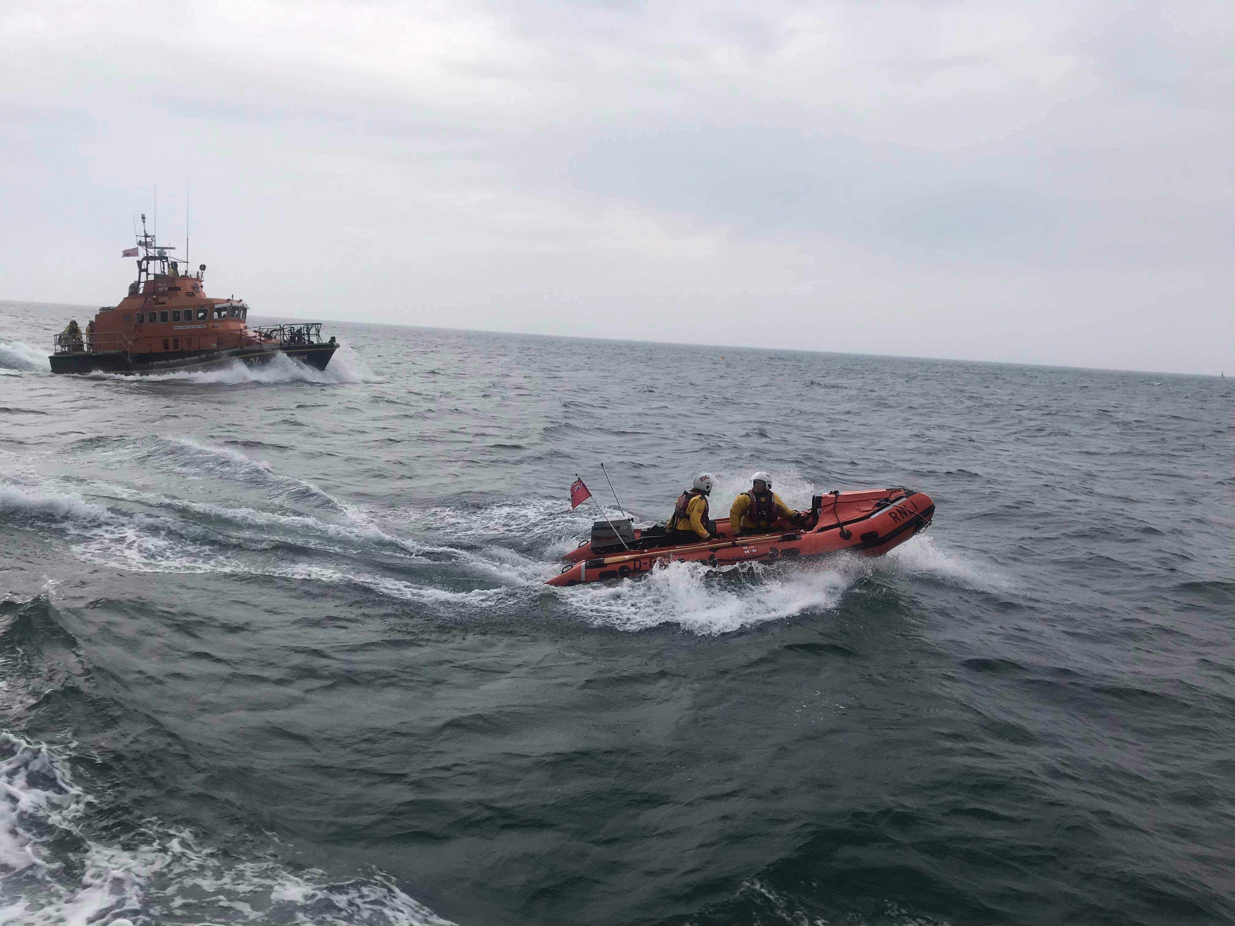 Whitby's all weather and inshore lifeboat at sea during the rescue of a fisherman.