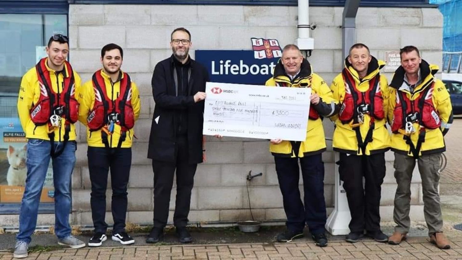 Eastbourne RNLI with a cheque for £3500 