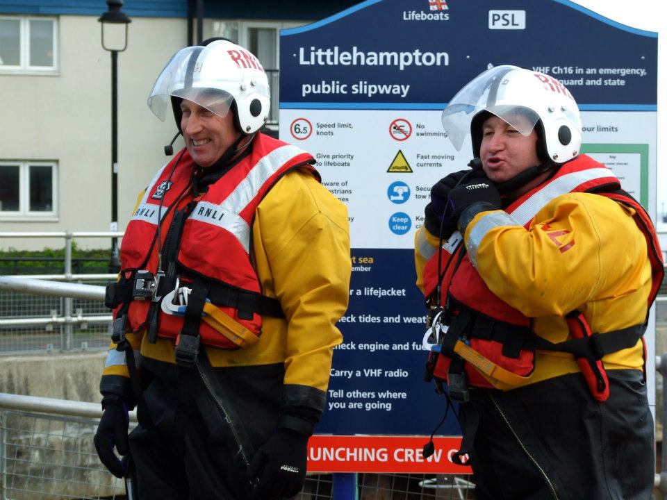 Andy Harris (left) and fellow helm Ivan Greer (right) in full lifesaving kit prepare for a training session (legacy photo pre-covid).