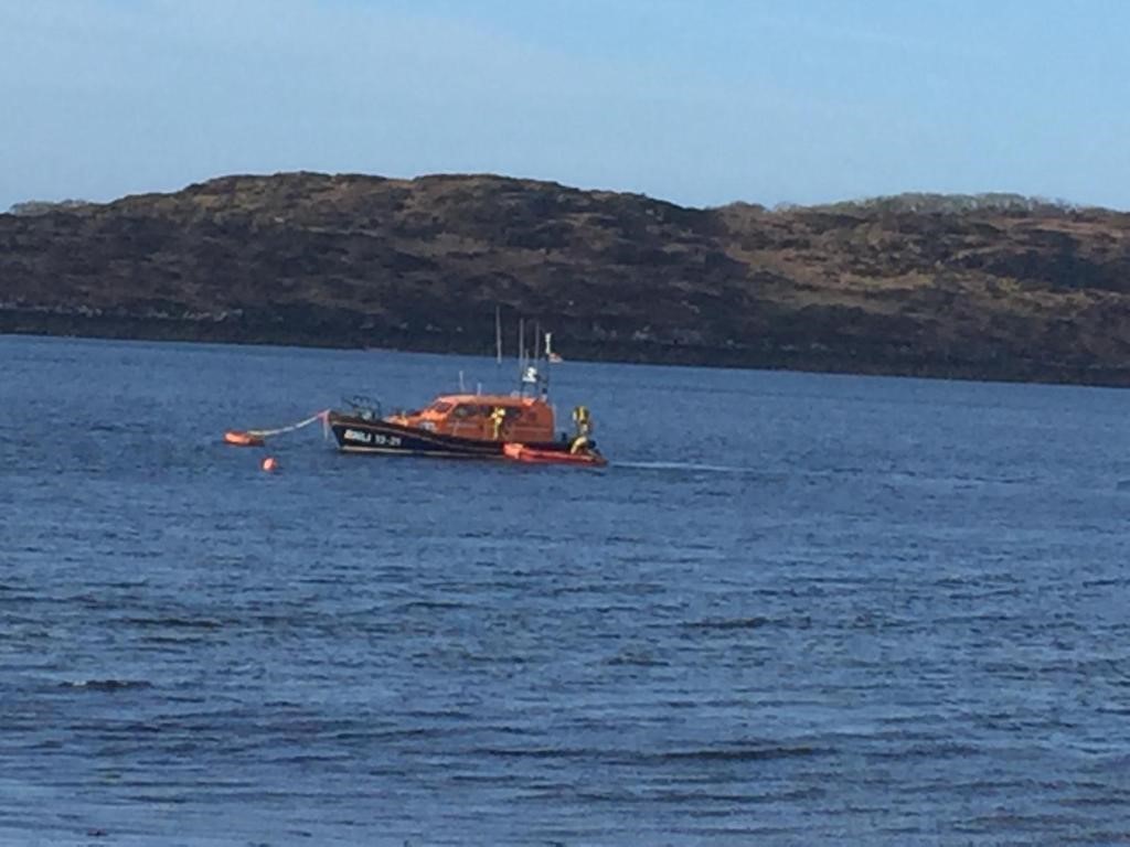 RNLI crew in operation in the sea after EPIRB is accidently activated