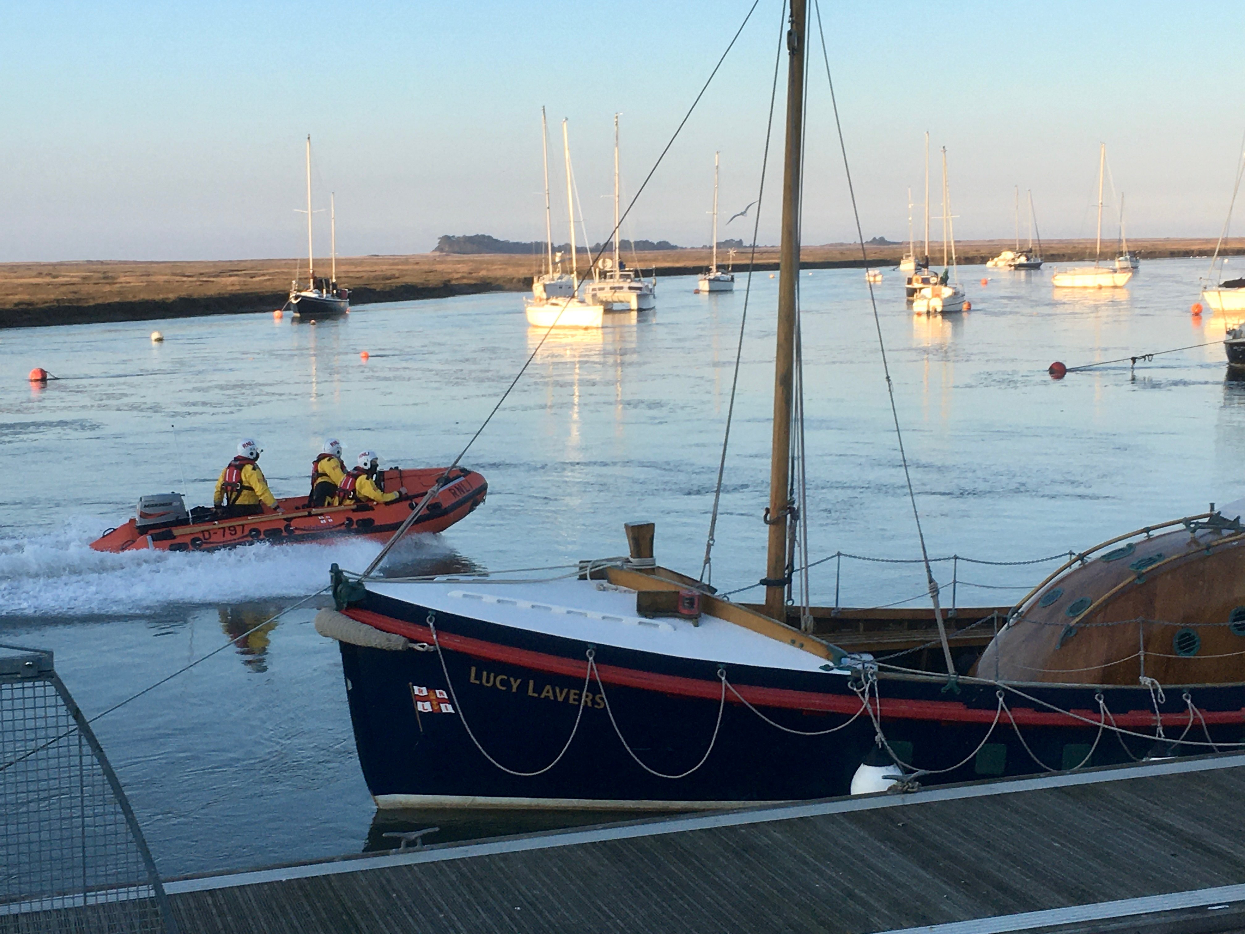 Wells RNLI crew members in their D-Class lifeboat