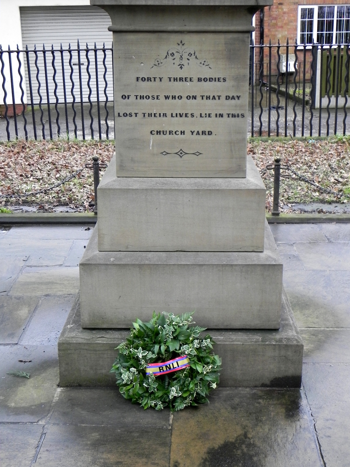 A wreath placed on a memorial
