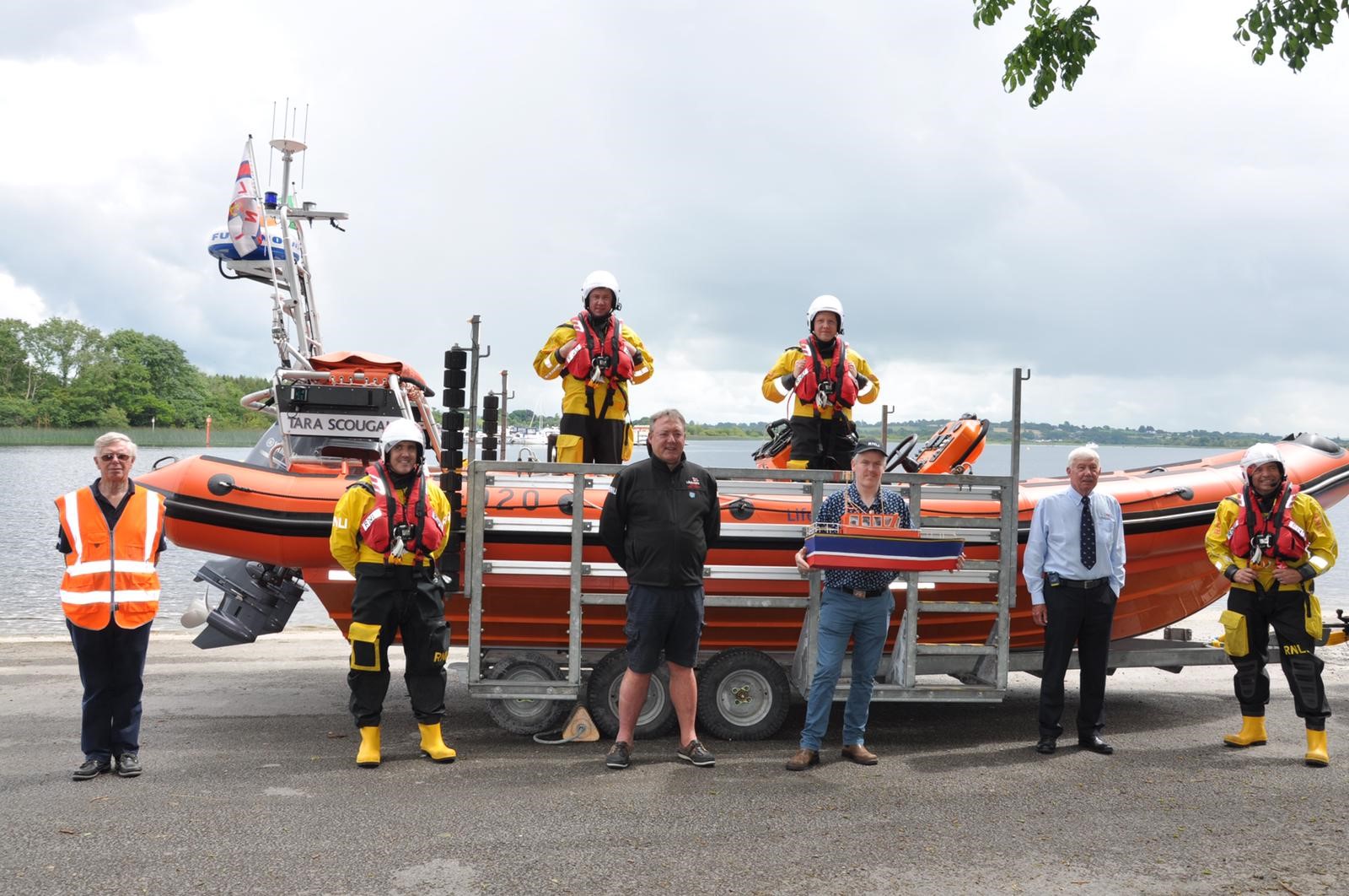 Left to Right: On board lifeboat: Tony Diskin &amp; Ray Cregg (crew). Foreground: Patrick Walsh (crew), Jude Kilmartin (Lifeboat Operations Manager), Mark Conway (artist) Tony McCarth &amp; Emmet Devereux (crew