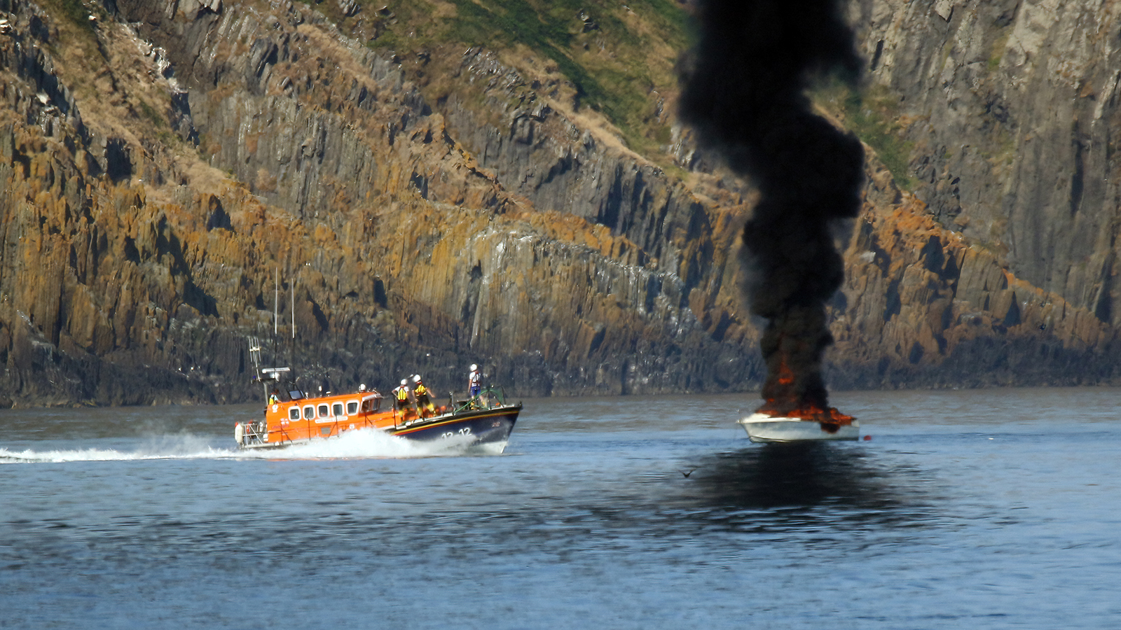 Casualty vessel with Douglas all-weather lifeboat, Marine Engineer standing by