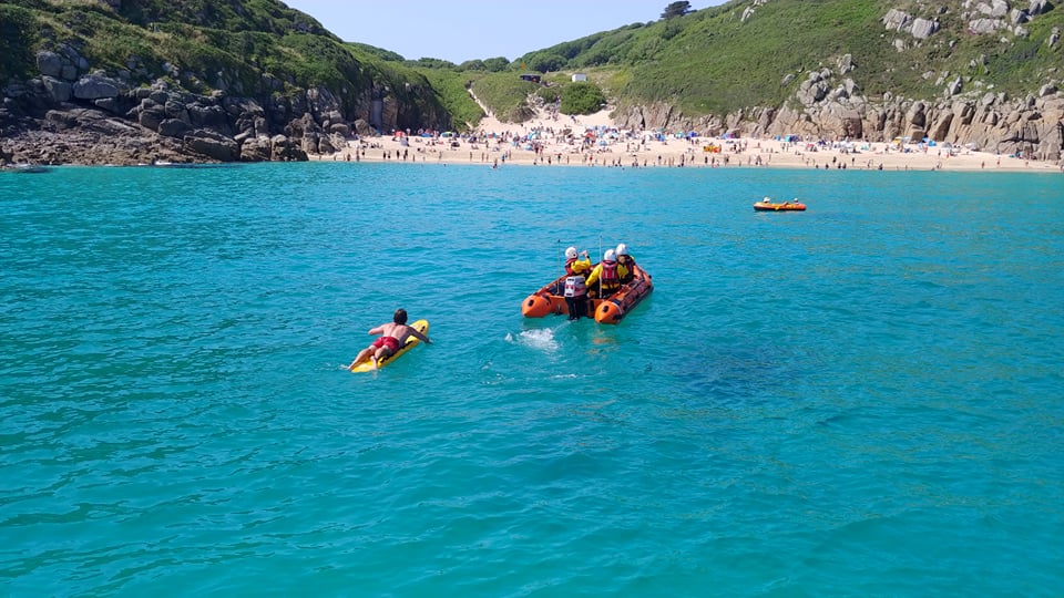 Sennen Cove ILB and lifeguard approaching Porthcurno beach