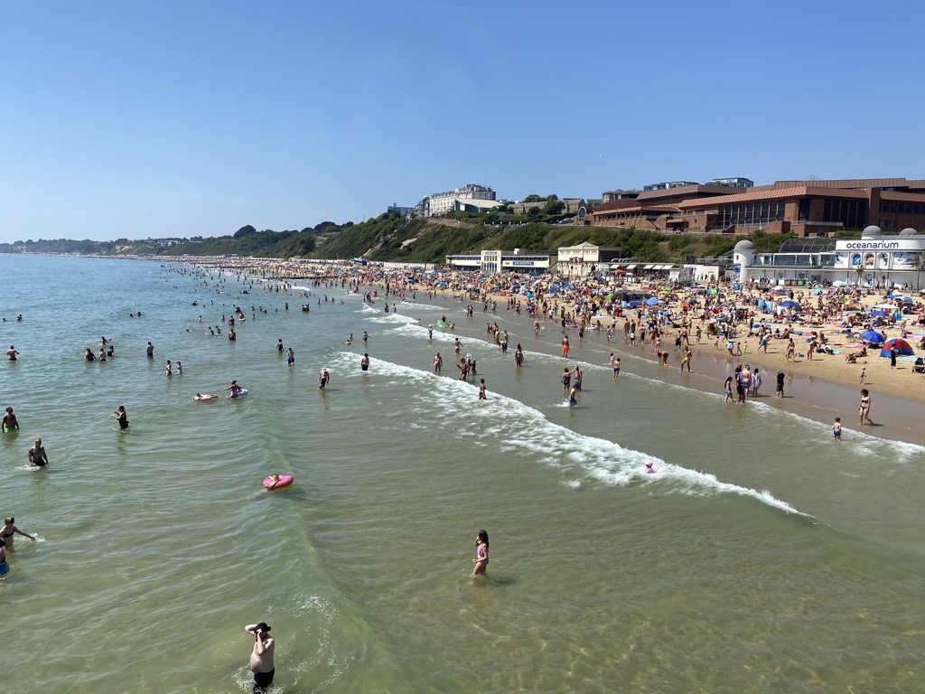 Busy bank holiday Bournemouth beach.